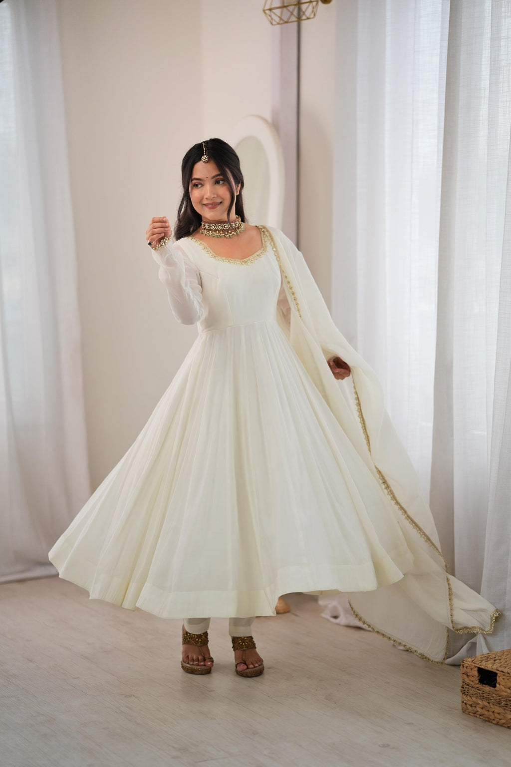Elegant Ivory Anarkali Gown with Sheer Sleeves, Golden Neckline Embellishment & Matching Dupatta