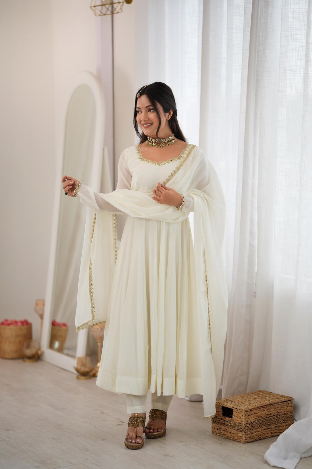 Elegant Ivory Anarkali Gown with Sheer Sleeves, Golden Neckline Embellishment & Matching Dupatta