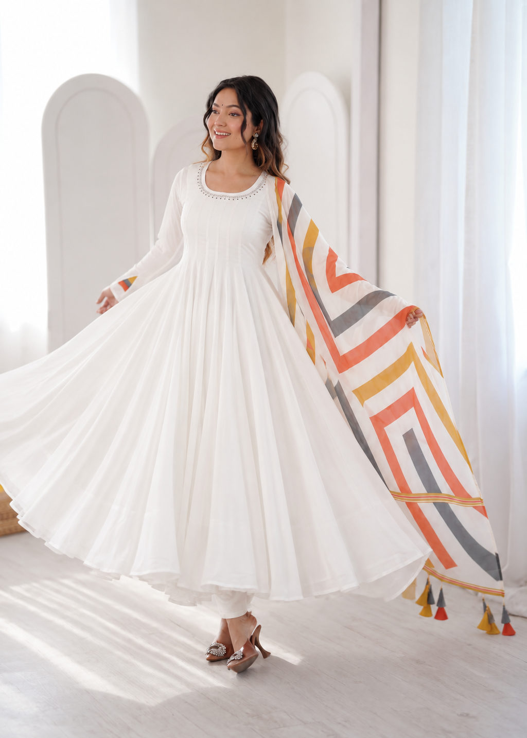 Elegant White Anarkali Suit with Multicolour Geometric Printed Dupatta & Tassel Detailing