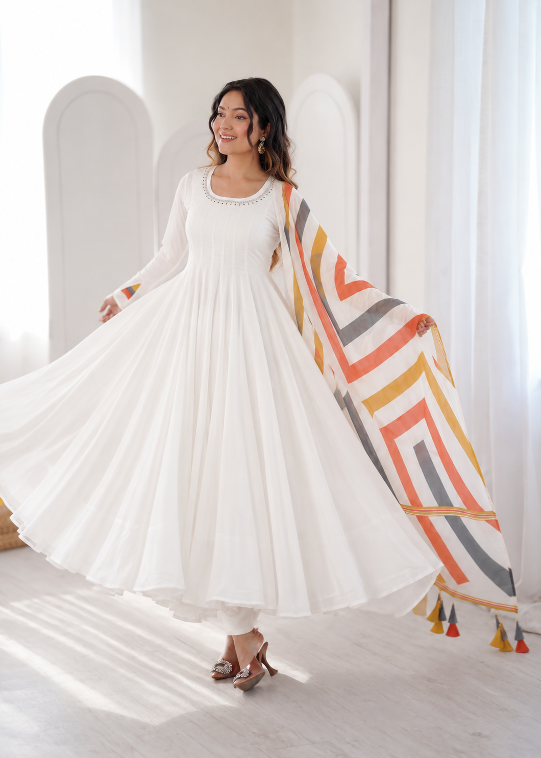 Elegant White Anarkali Suit with Multicolour Geometric Printed Dupatta & Tassel Detailing