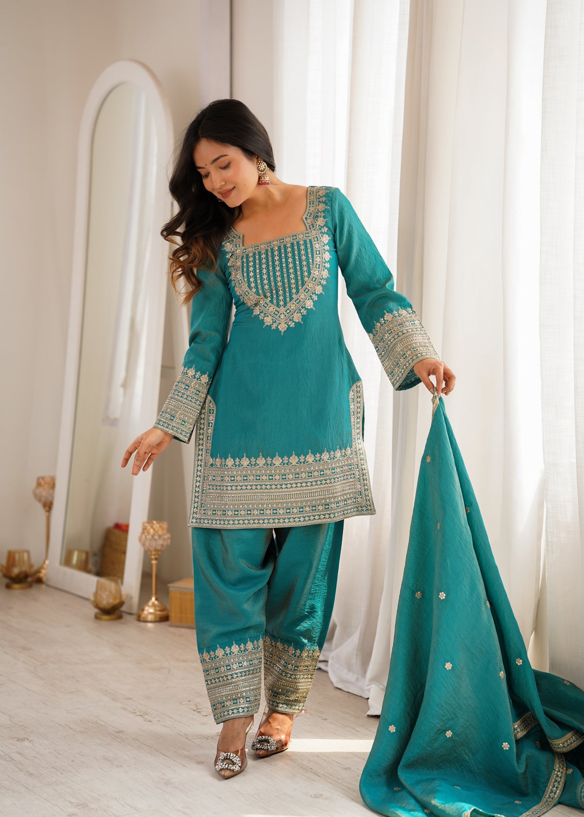 Regal Teal Blue Embroidered Kurta Pant Set with Intricate Gold Zari Neckline, Ornate Hem Borders, Embellished Pants & Matching Dupatta