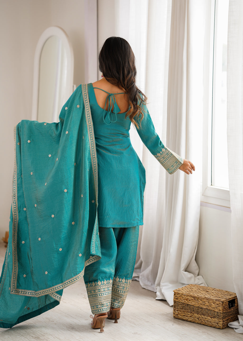 Regal Teal Blue Embroidered Kurta Pant Set with Intricate Gold Zari Neckline, Ornate Hem Borders, Embellished Pants & Matching Dupatta