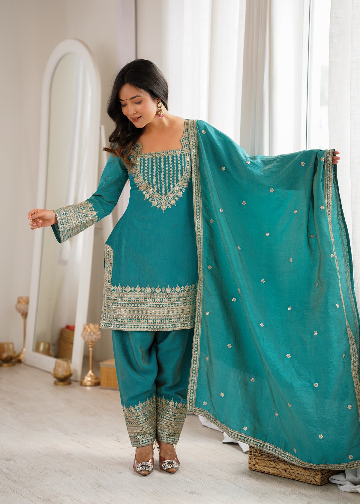 Regal Teal Blue Embroidered Kurta Pant Set with Intricate Gold Zari Neckline, Ornate Hem Borders, Embellished Pants & Matching Dupatta
