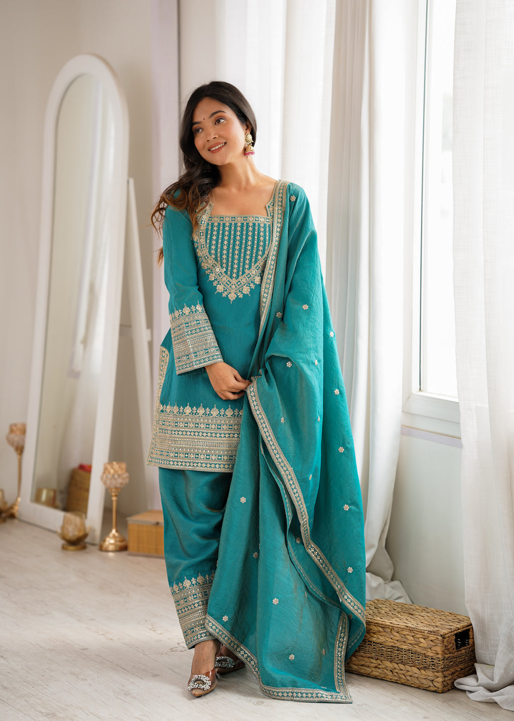 Regal Teal Blue Embroidered Kurta Pant Set with Intricate Gold Zari Neckline, Ornate Hem Borders, Embellished Pants & Matching Dupatta