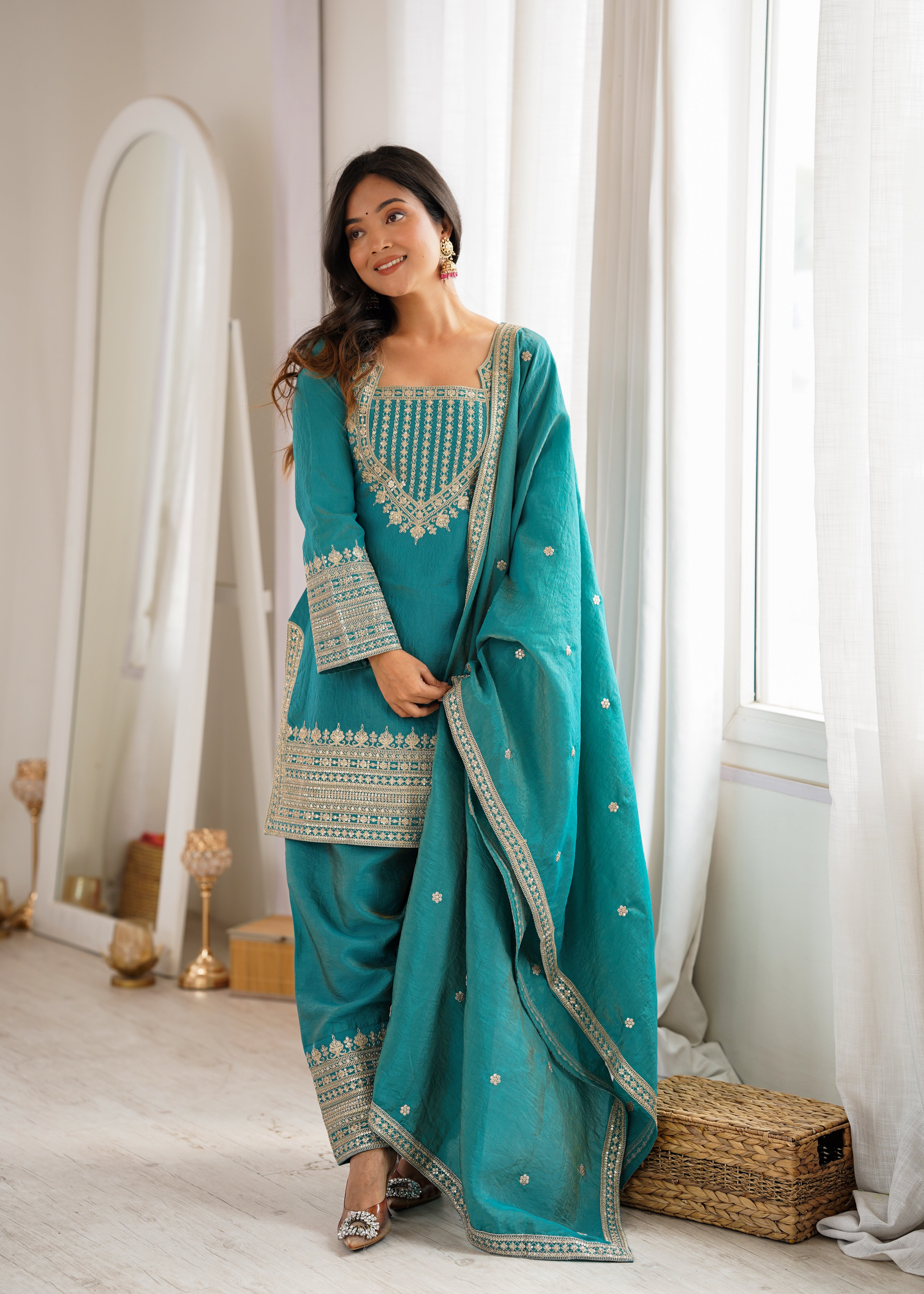 Regal Teal Blue Embroidered Kurta Pant Set with Intricate Gold Zari Neckline, Ornate Hem Borders, Embellished Pants & Matching Dupatta