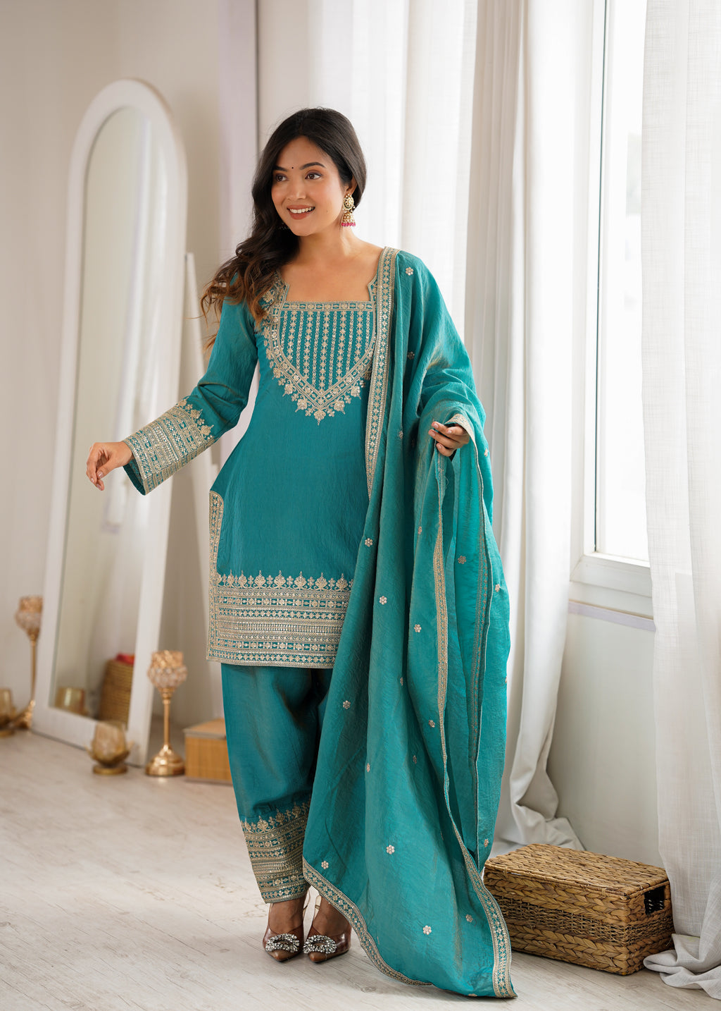Regal Teal Blue Embroidered Kurta Pant Set with Intricate Gold Zari Neckline, Ornate Hem Borders, Embellished Pants & Matching Dupatta