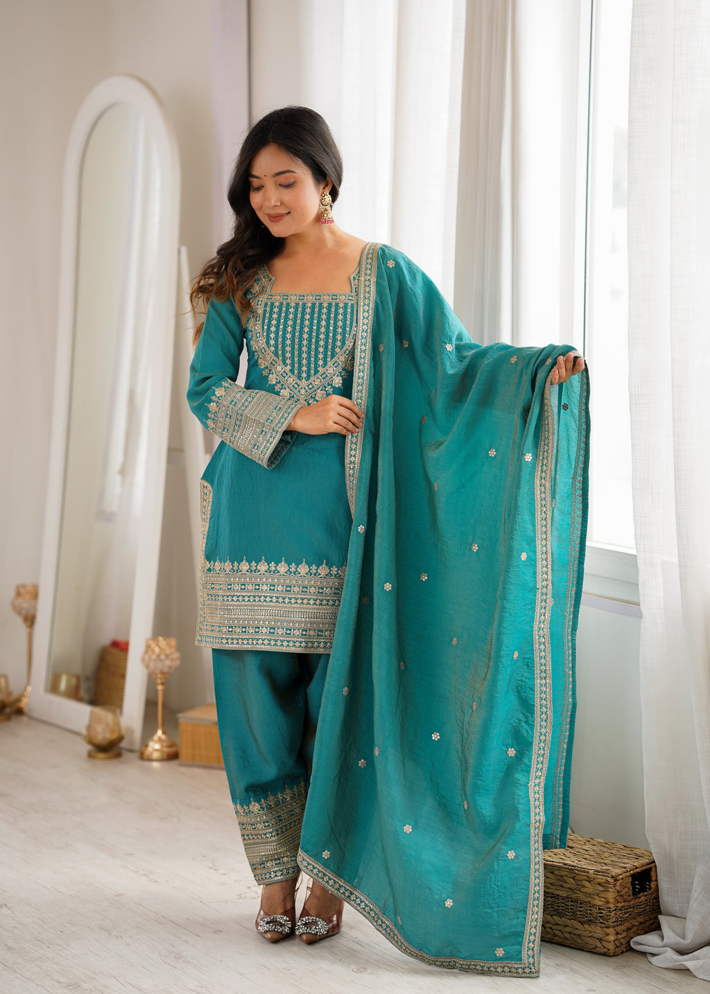 Regal Teal Blue Embroidered Kurta Pant Set with Intricate Gold Zari Neckline, Ornate Hem Borders, Embellished Pants & Matching Dupatta