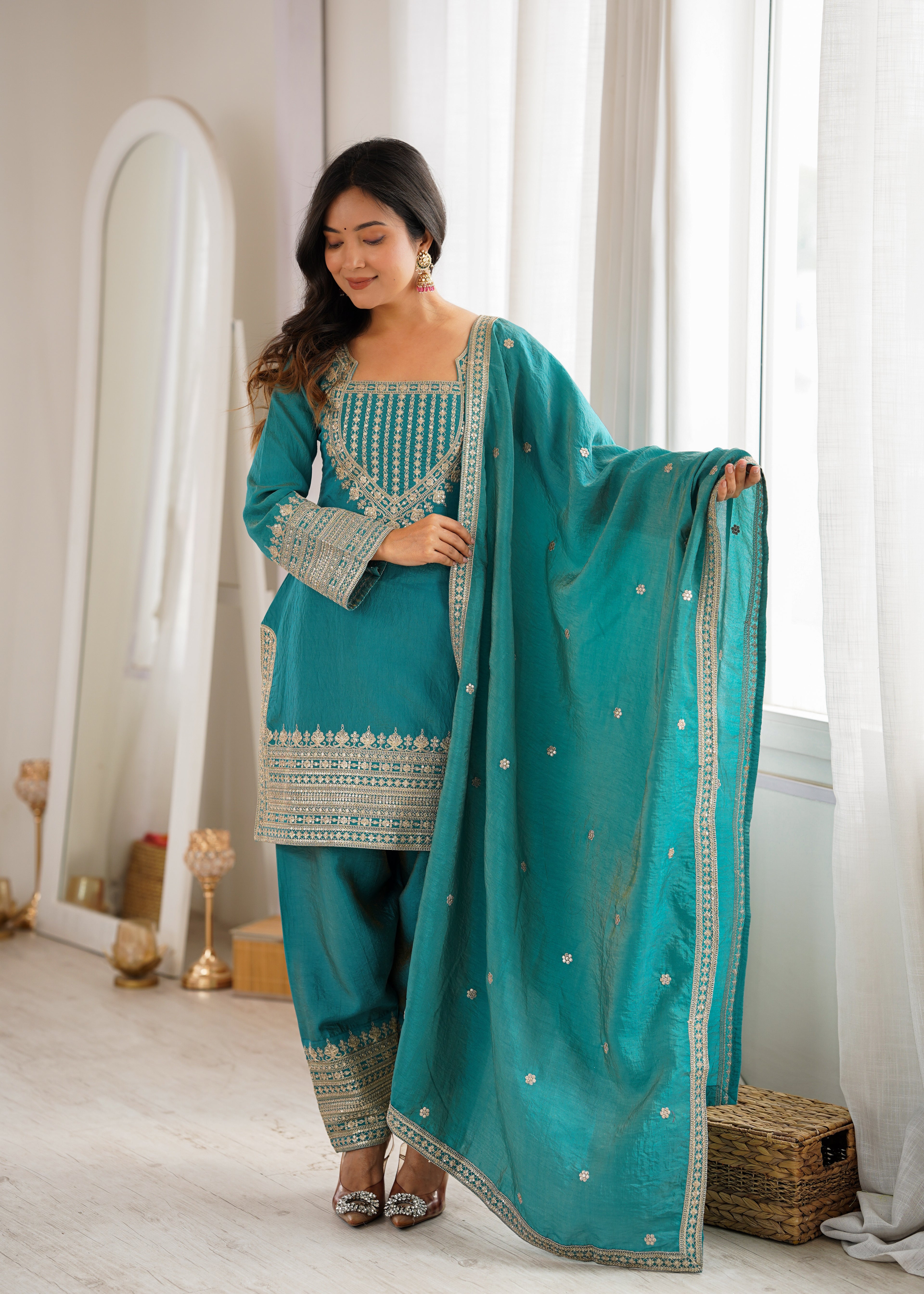 Regal Teal Blue Embroidered Kurta Pant Set with Intricate Gold Zari Neckline, Ornate Hem Borders, Embellished Pants & Matching Dupatta