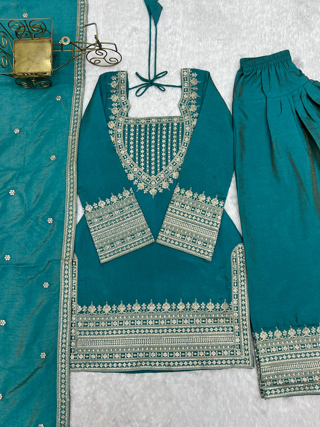 Regal Teal Blue Embroidered Kurta Pant Set with Intricate Gold Zari Neckline, Ornate Hem Borders, Embellished Pants & Matching Dupatta