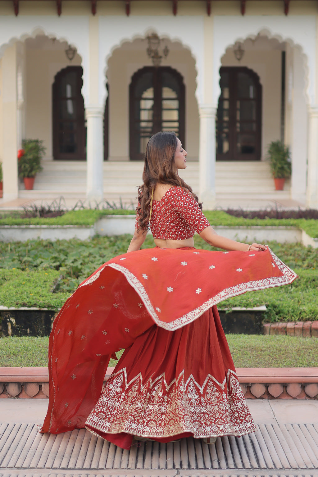 Omira Orange Color Vichitra Silk Sequins Thread Embroidered Lehenga Choli
