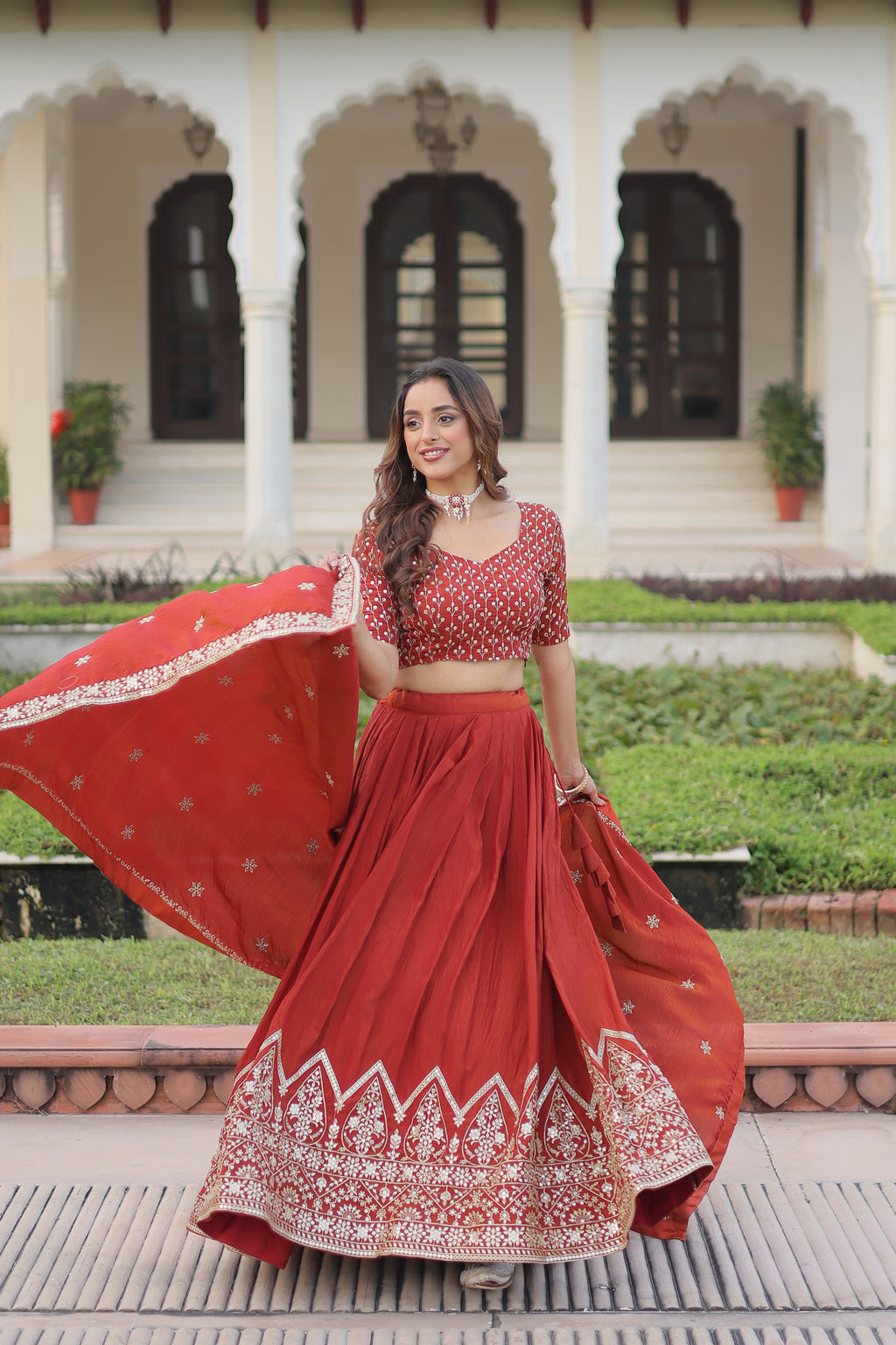 Omira Orange Color Vichitra Silk Sequins Thread Embroidered Lehenga Choli