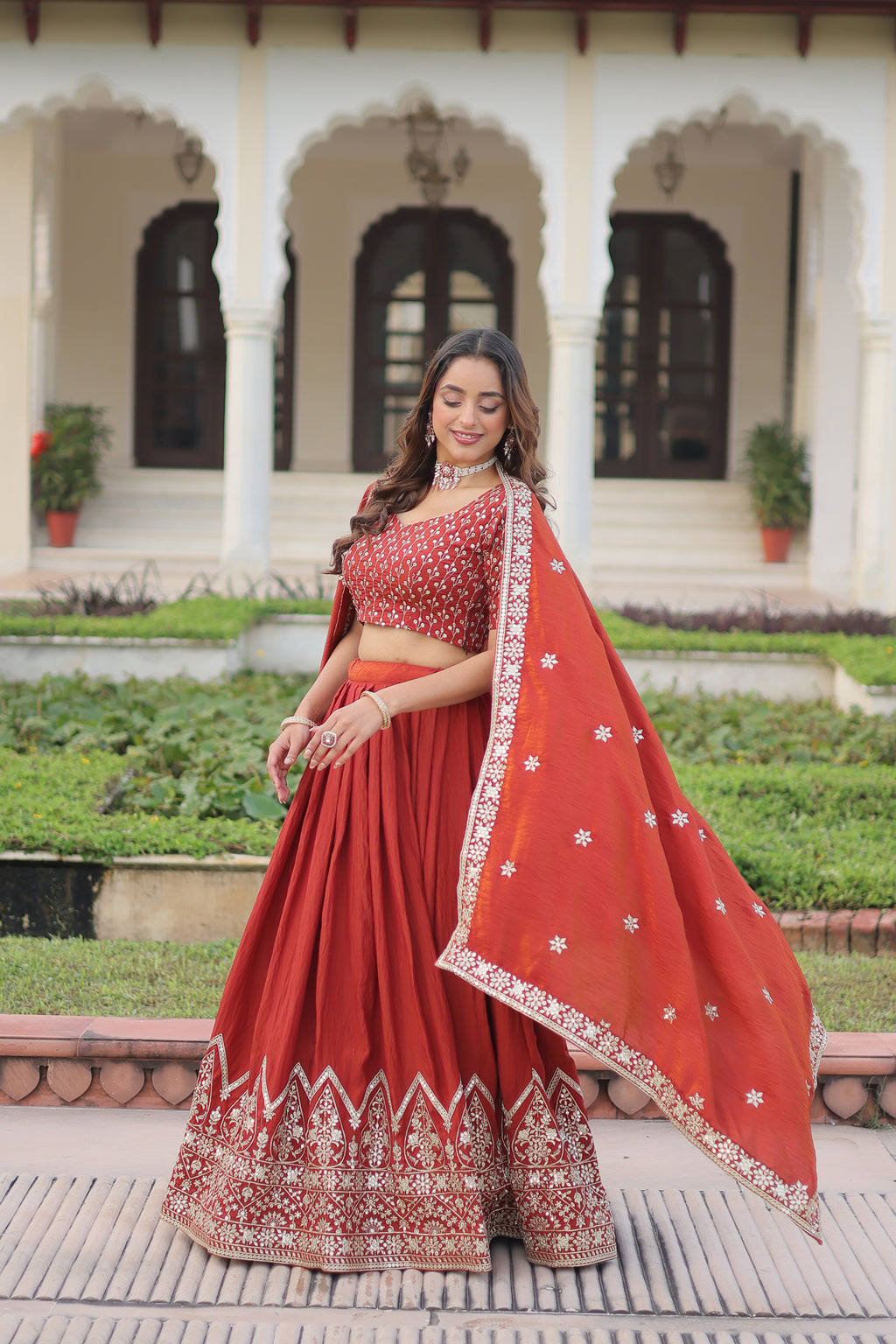 Omira Orange Color Vichitra Silk Sequins Thread Embroidered Lehenga Choli