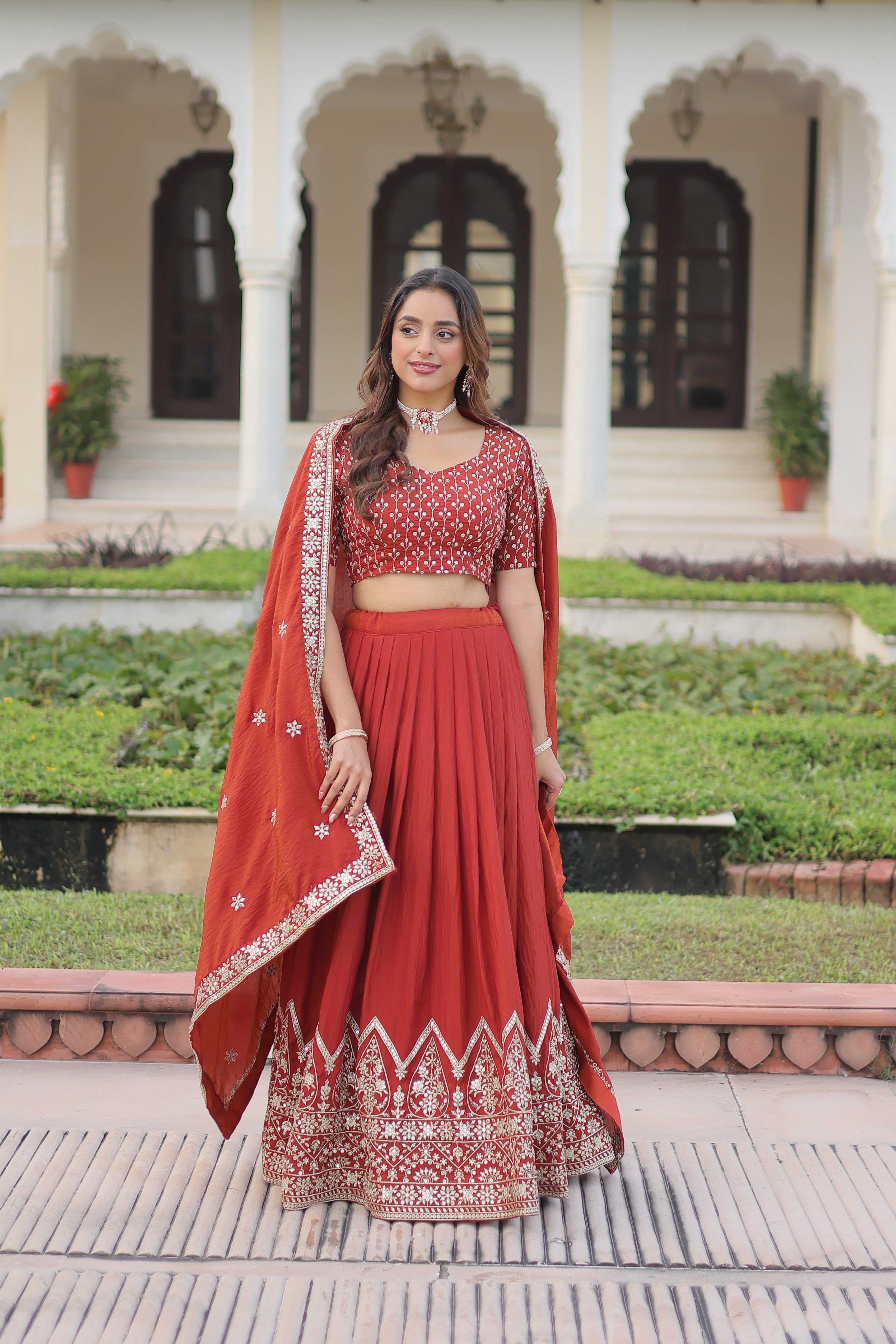 Omira Orange Color Vichitra Silk Sequins Thread Embroidered Lehenga Choli