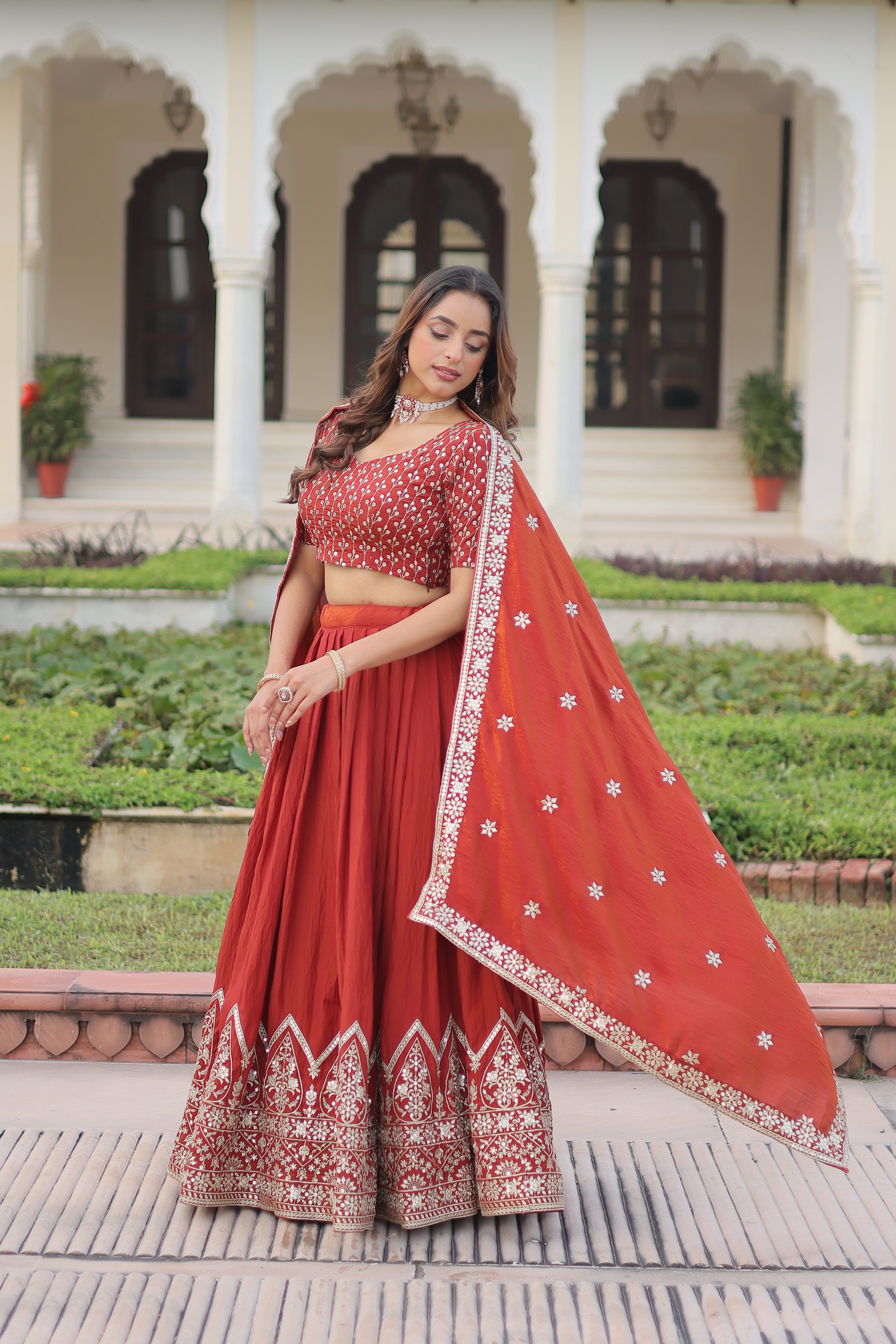 Omira Orange Color Vichitra Silk Sequins Thread Embroidered Lehenga Choli