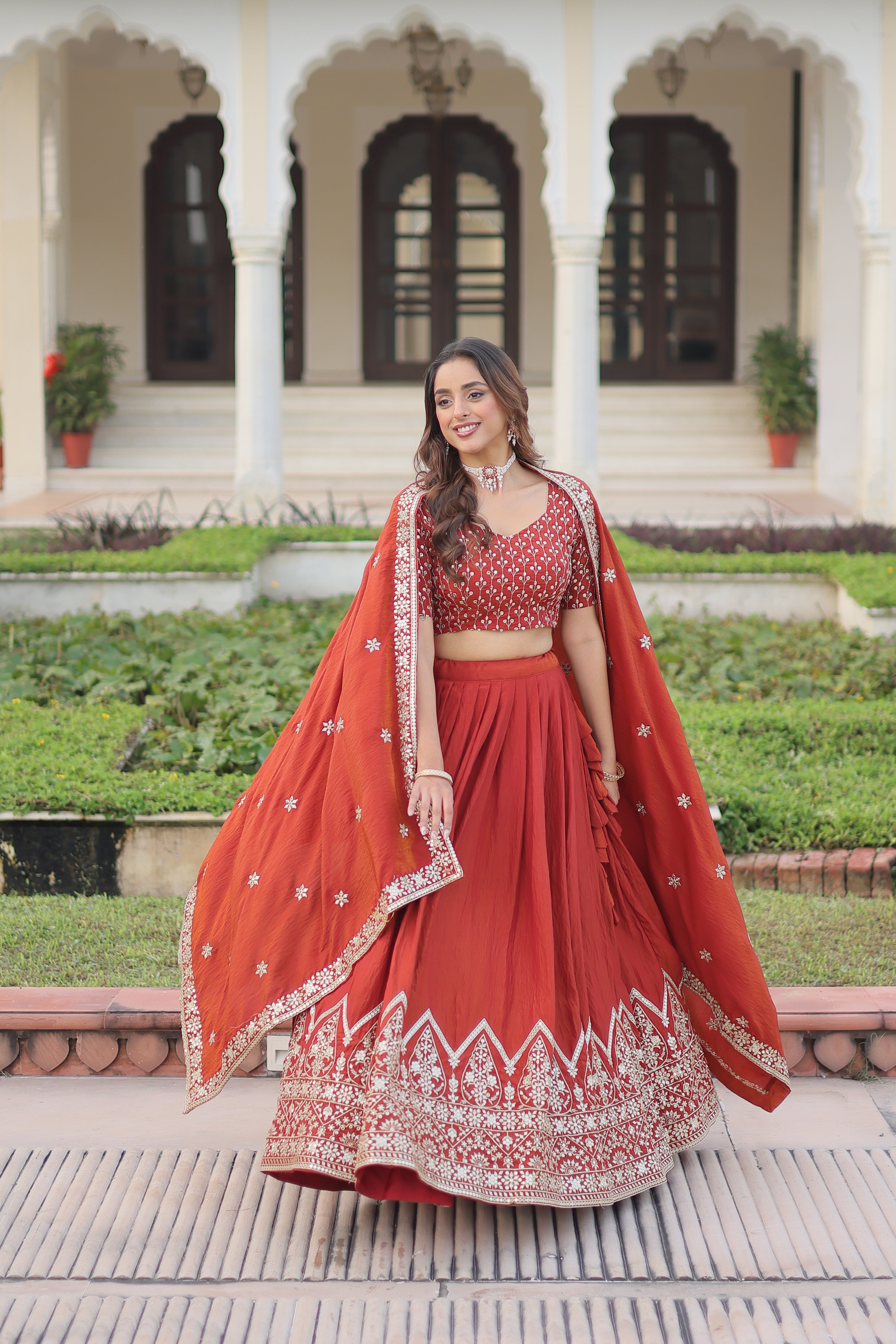 Omira Orange Color Vichitra Silk Sequins Thread Embroidered Lehenga Choli