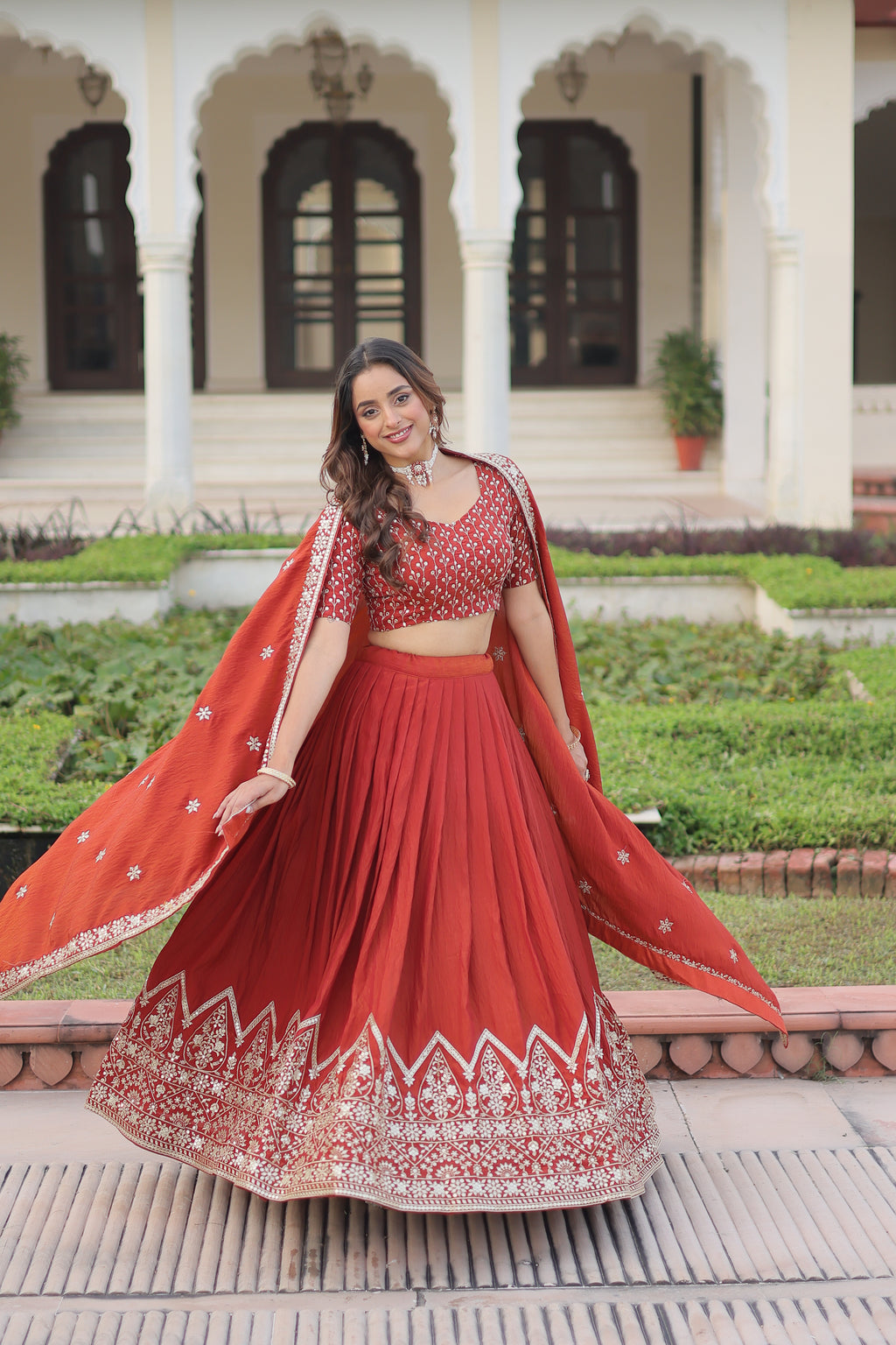 Omira Orange Color Vichitra Silk Sequins Thread Embroidered Lehenga Choli