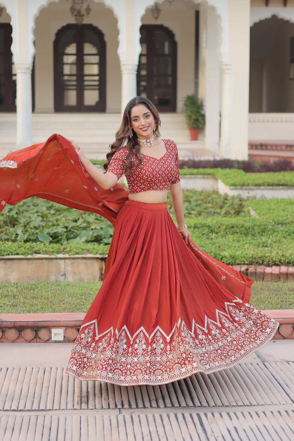 Omira Orange Color Vichitra Silk Sequins Thread Embroidered Lehenga Choli