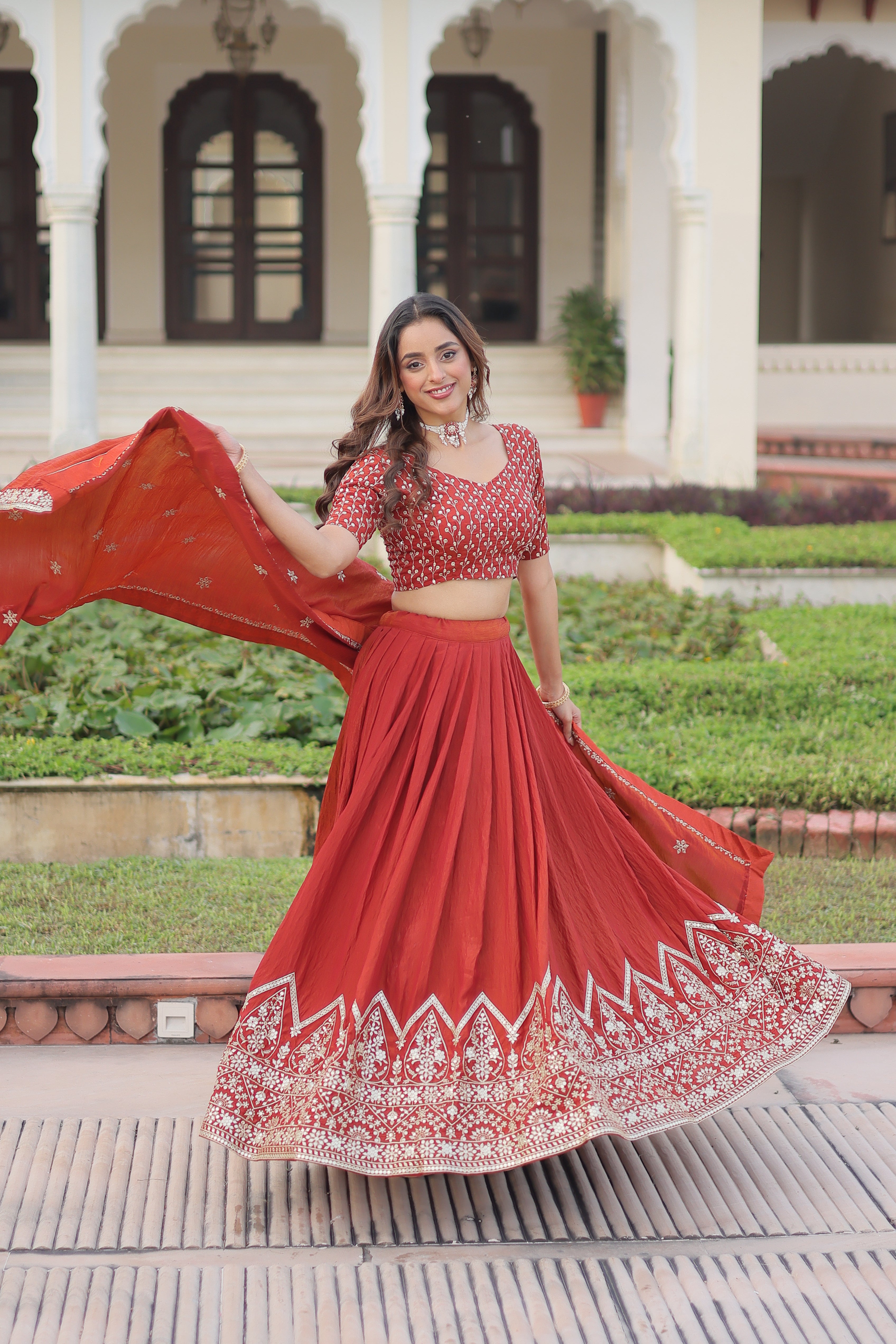 Omira Orange Color Vichitra Silk Sequins Thread Embroidered Lehenga Choli