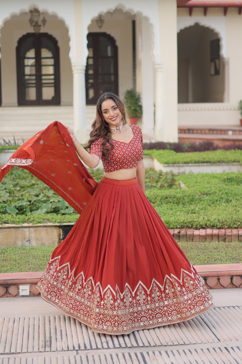 Omira Orange Color Vichitra Silk Sequins Thread Embroidered Lehenga Choli