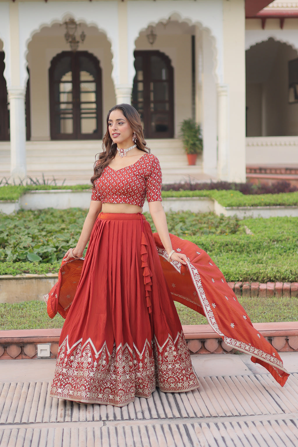 Omira Orange Color Vichitra Silk Sequins Thread Embroidered Lehenga Choli