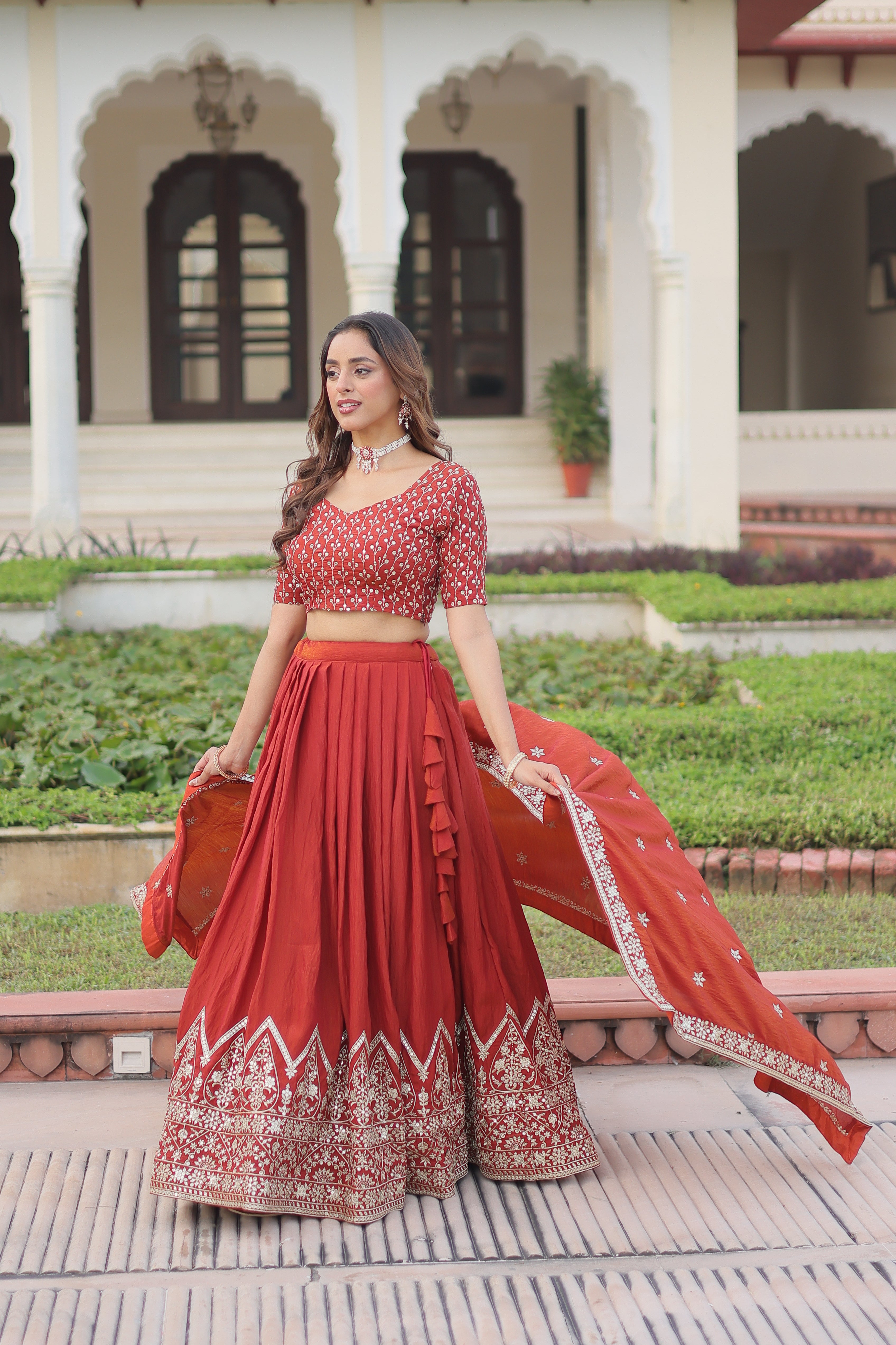 Omira Orange Color Vichitra Silk Sequins Thread Embroidered Lehenga Choli