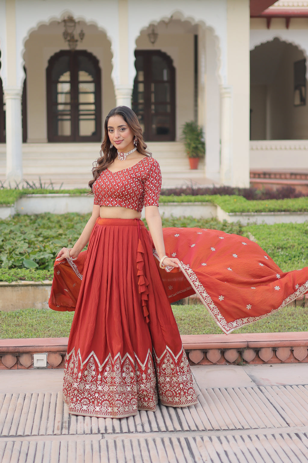 Omira Orange Color Vichitra Silk Sequins Thread Embroidered Lehenga Choli