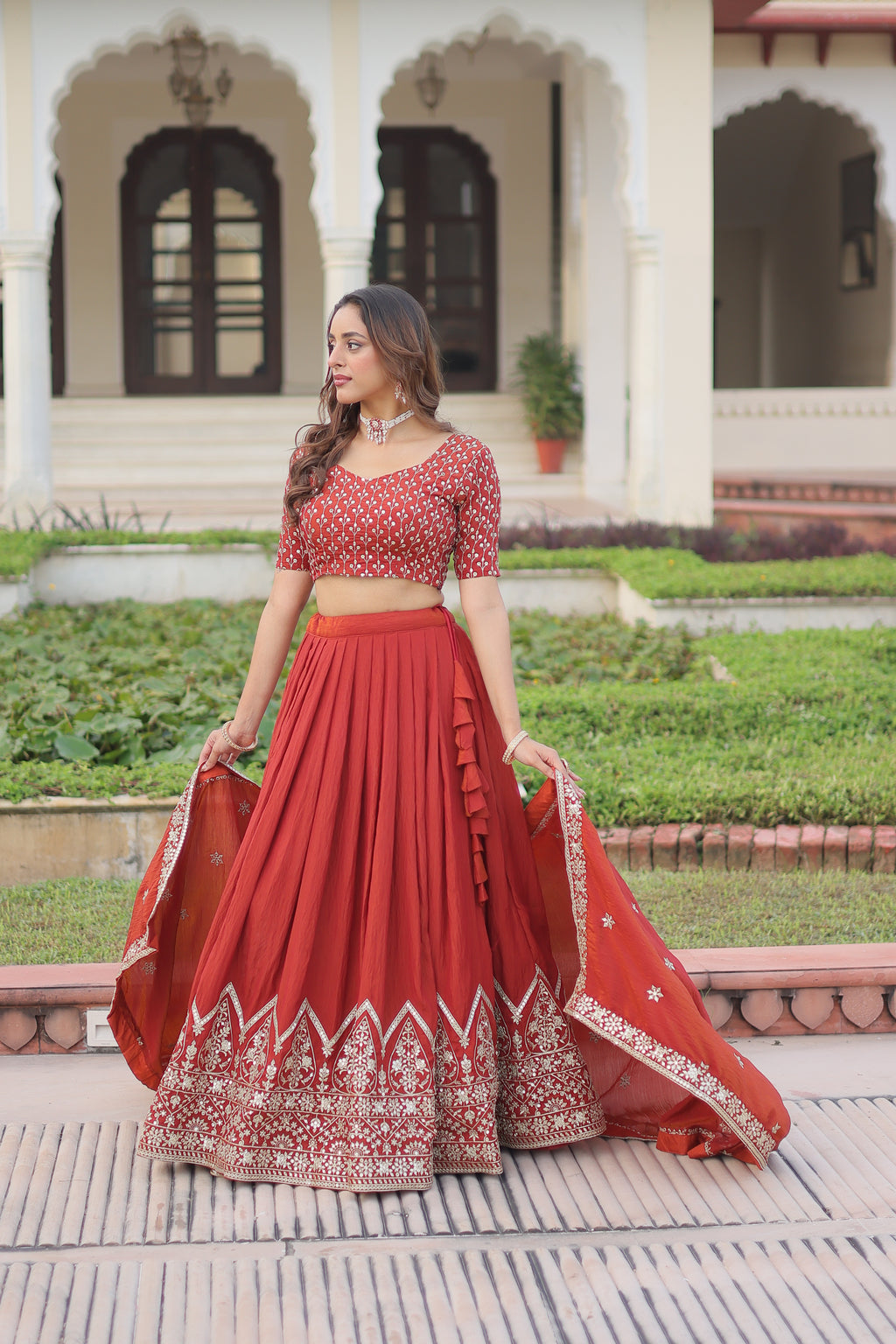 Omira Orange Color Vichitra Silk Sequins Thread Embroidered Lehenga Choli