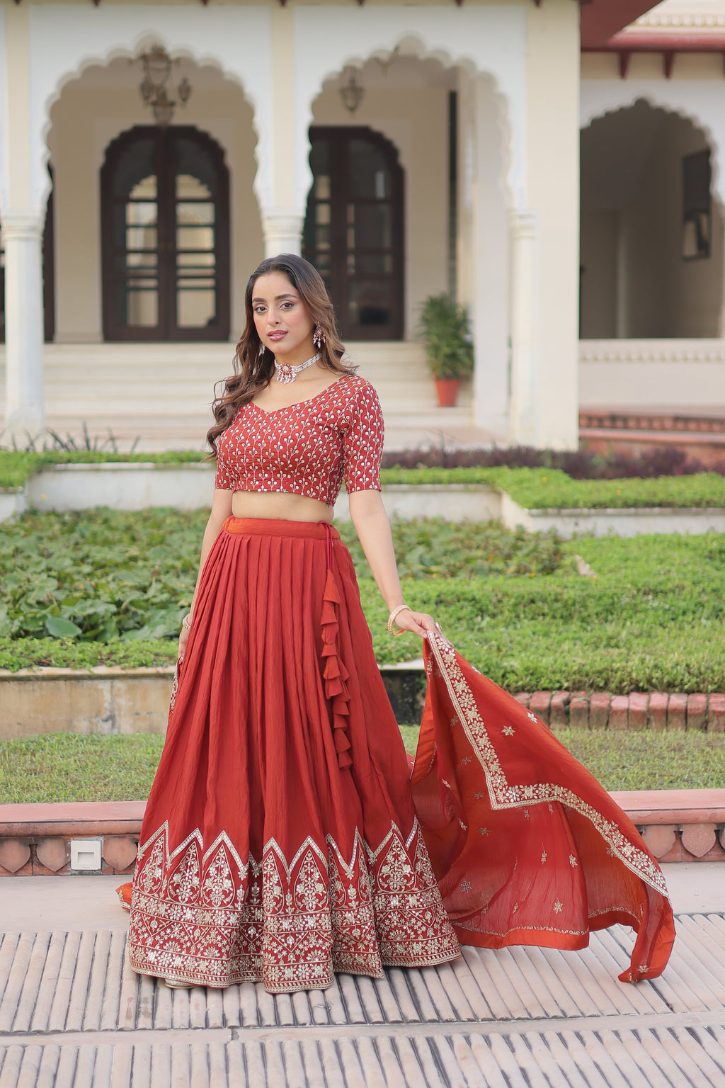 Omira Orange Color Vichitra Silk Sequins Thread Embroidered Lehenga Choli