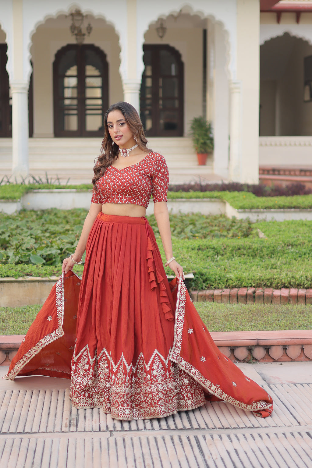 Omira Orange Color Vichitra Silk Sequins Thread Embroidered Lehenga Choli