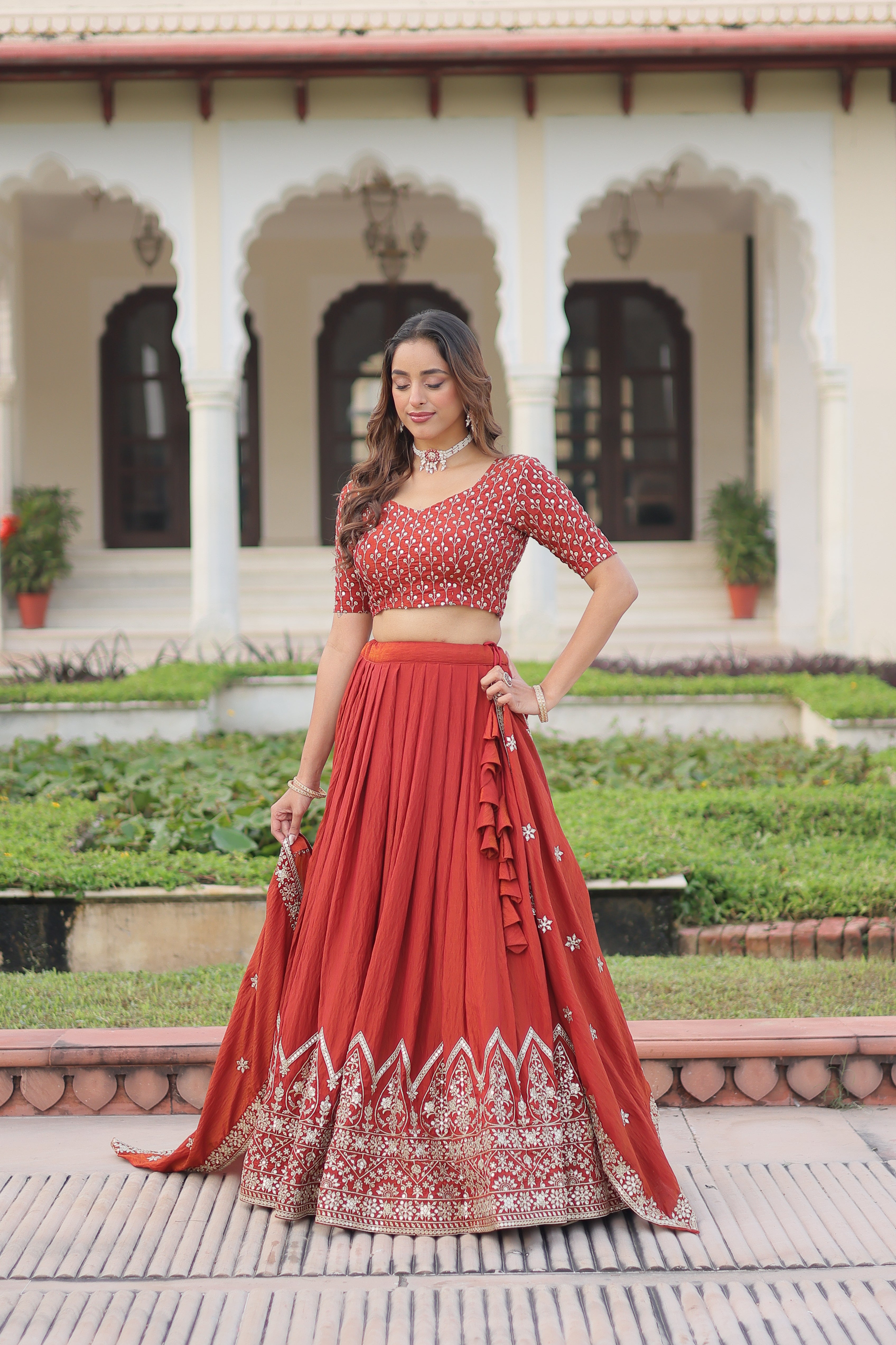 Omira Orange Color Vichitra Silk Sequins Thread Embroidered Lehenga Choli