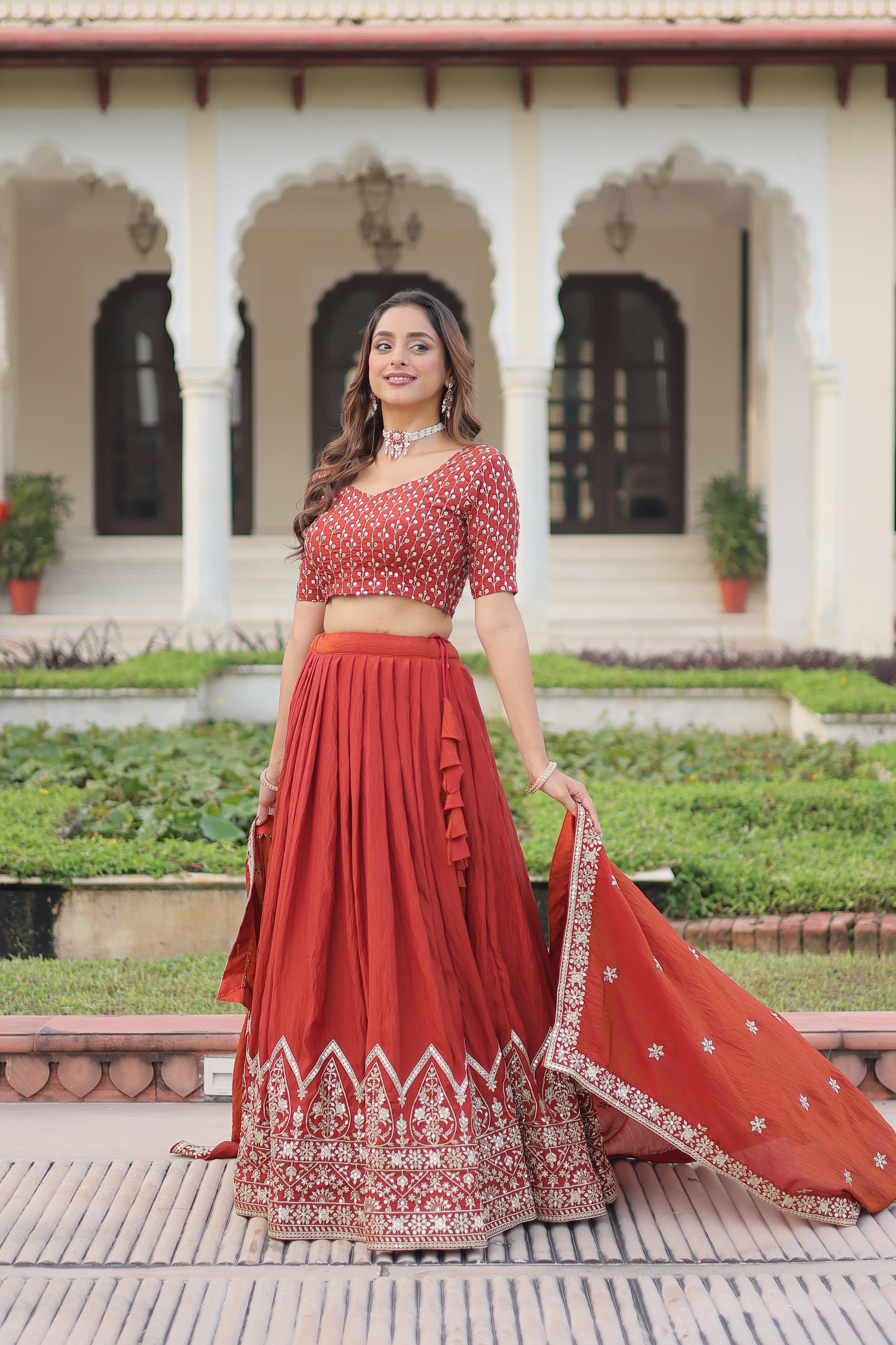 Omira Orange Color Vichitra Silk Sequins Thread Embroidered Lehenga Choli