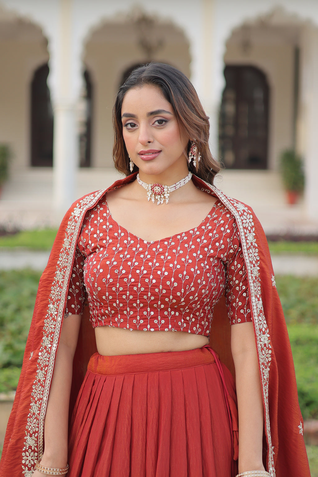 Omira Orange Color Vichitra Silk Sequins Thread Embroidered Lehenga Choli