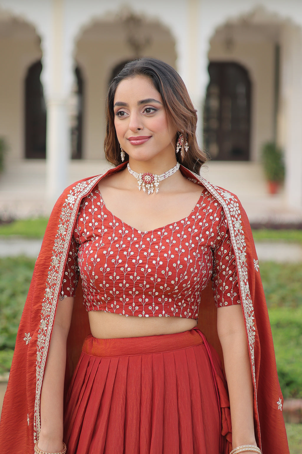 Omira Orange Color Vichitra Silk Sequins Thread Embroidered Lehenga Choli