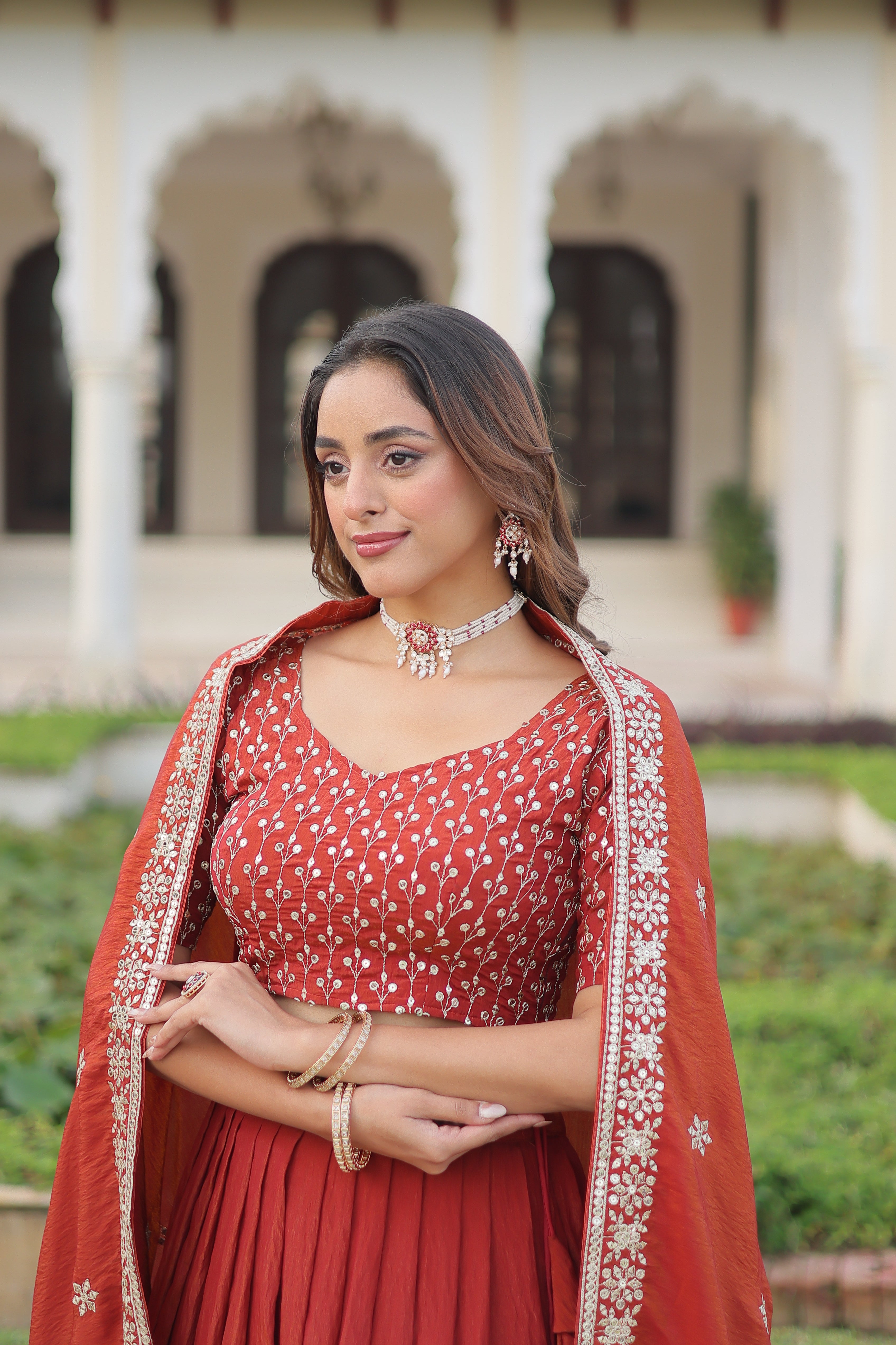 Omira Orange Color Vichitra Silk Sequins Thread Embroidered Lehenga Choli