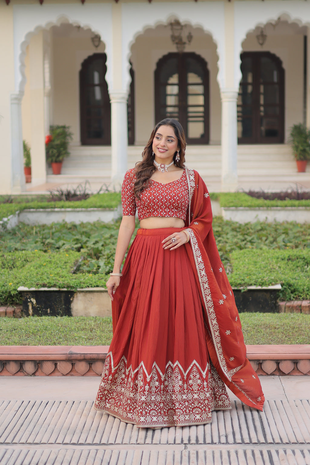 Omira Orange Color Vichitra Silk Sequins Thread Embroidered Lehenga Choli