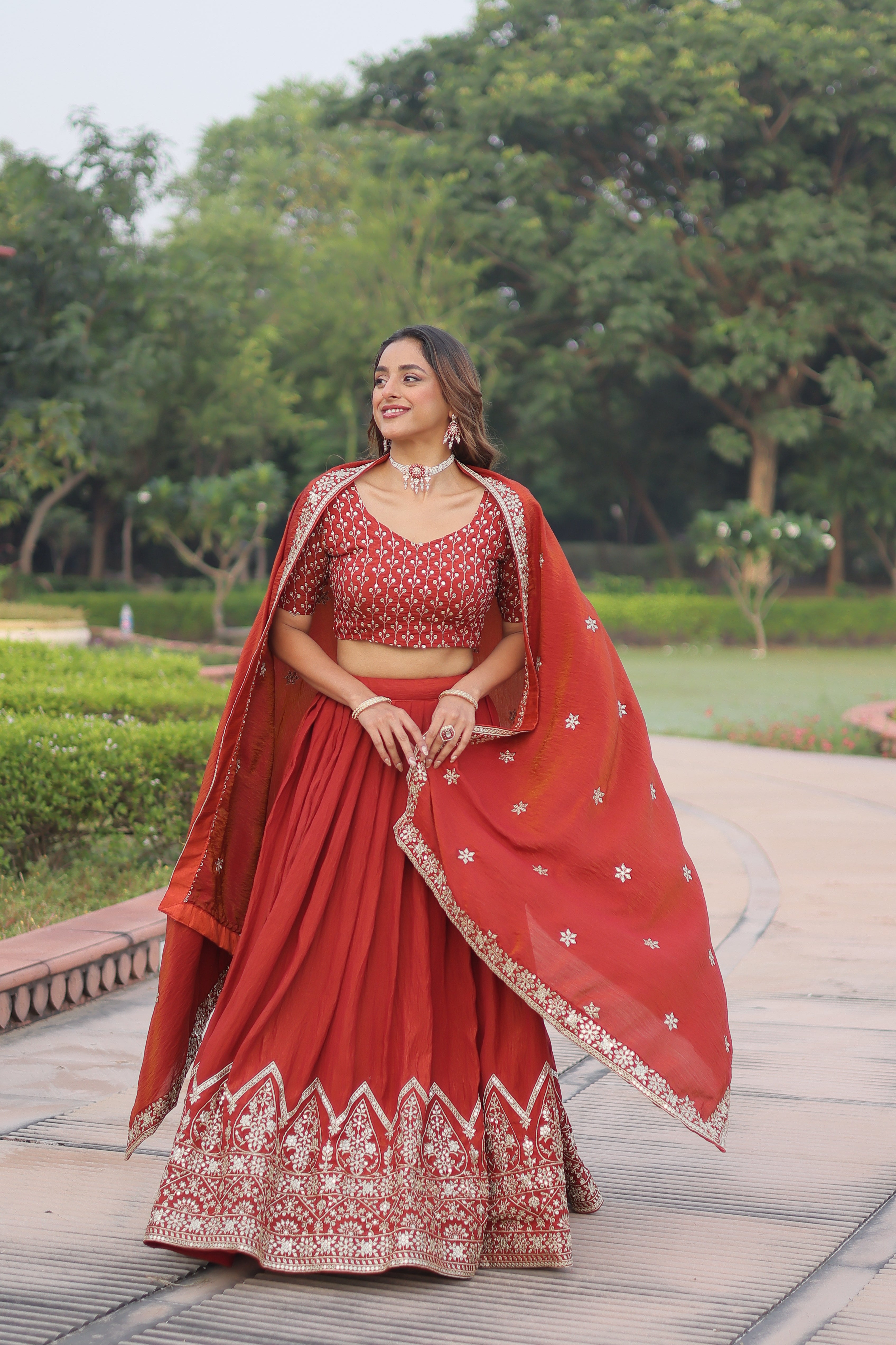 Omira Orange Color Vichitra Silk Sequins Thread Embroidered Lehenga Choli