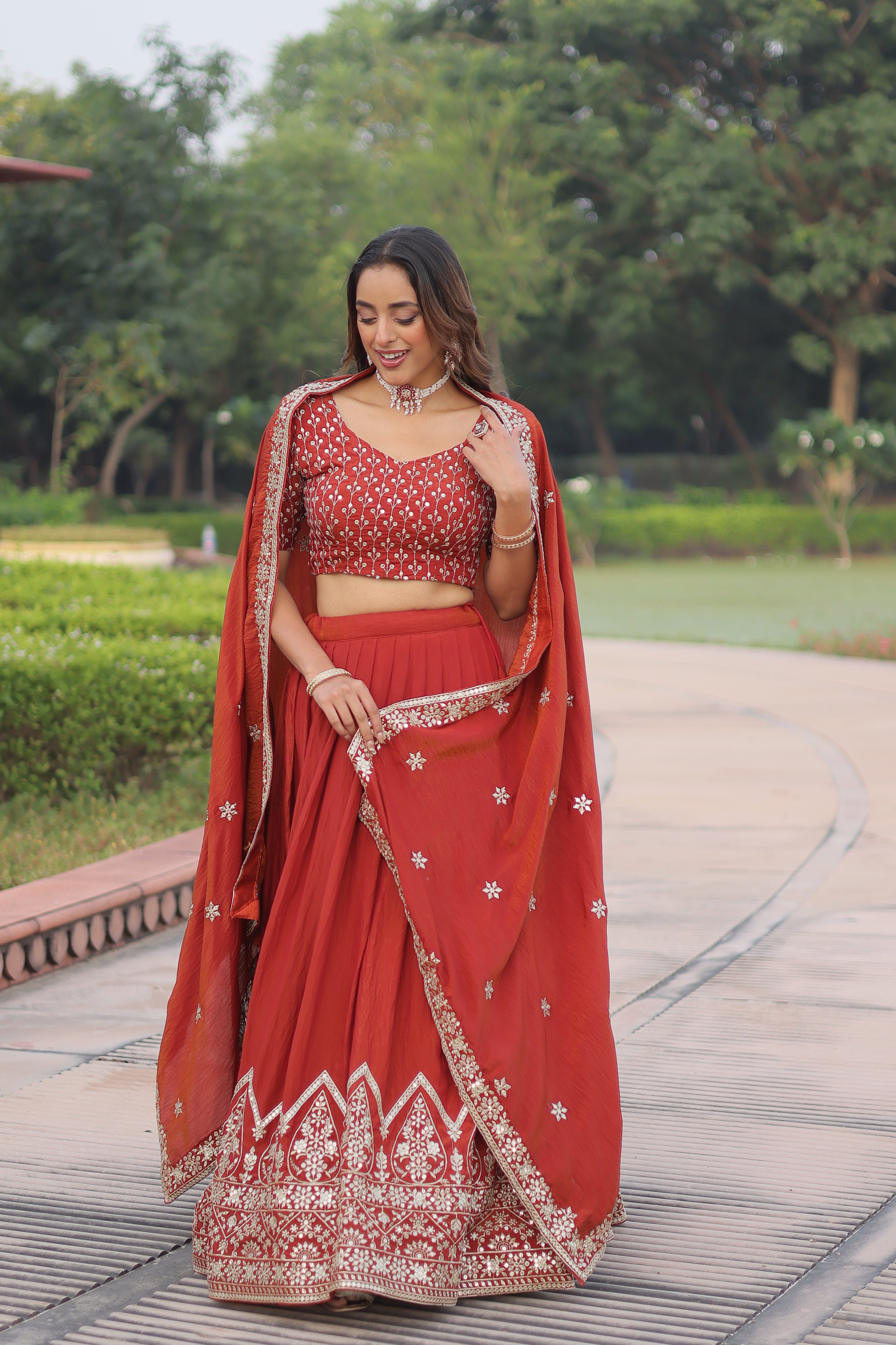 Omira Orange Color Vichitra Silk Sequins Thread Embroidered Lehenga Choli