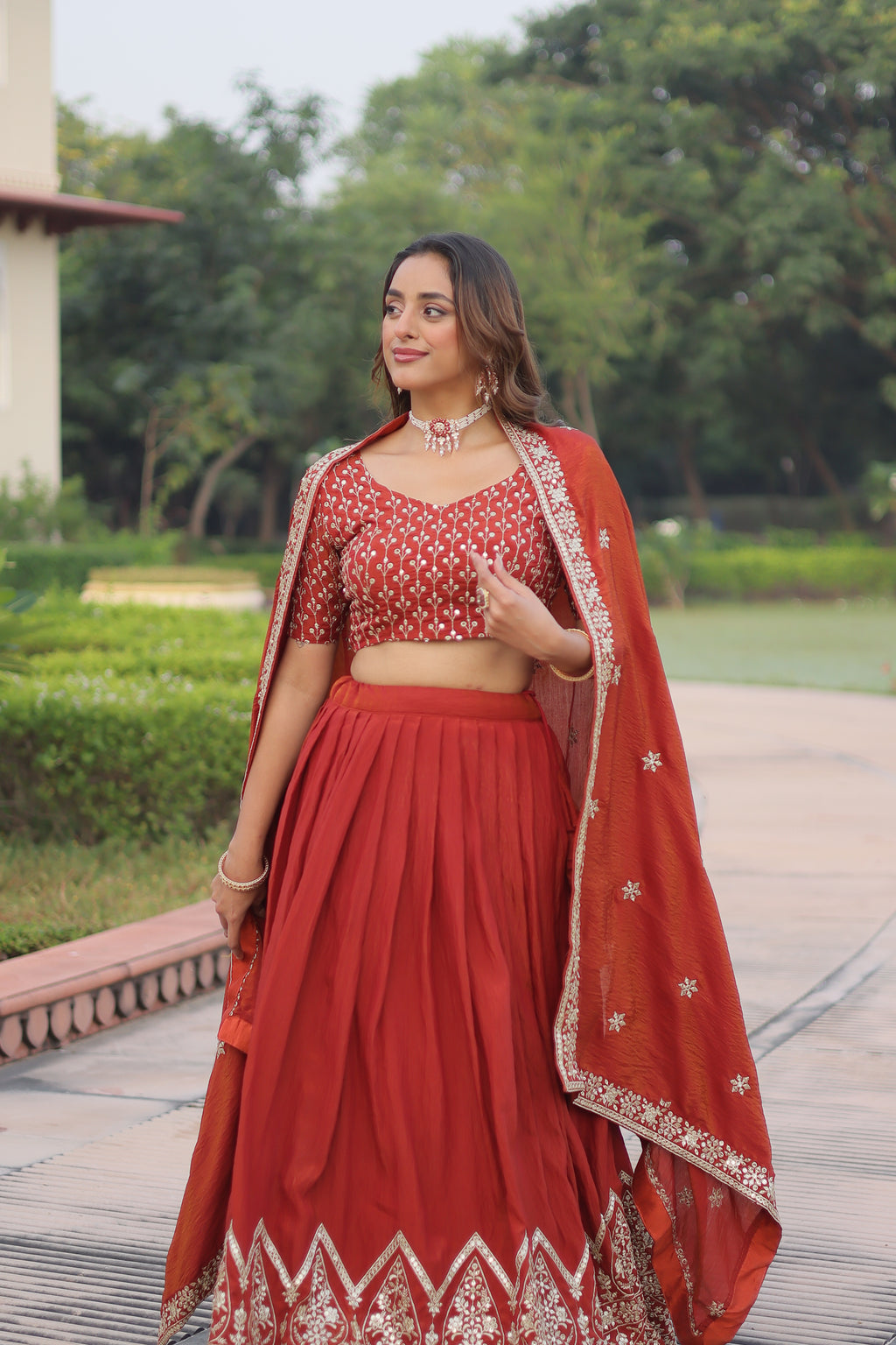 Omira Orange Color Vichitra Silk Sequins Thread Embroidered Lehenga Choli