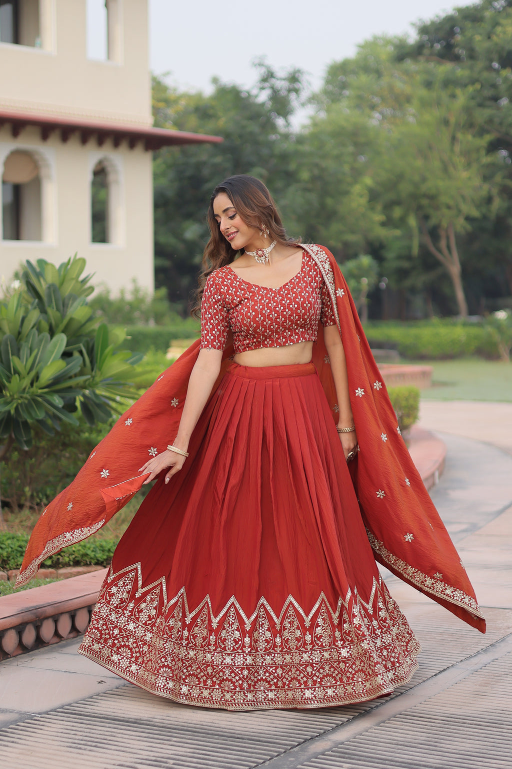 Omira Orange Color Vichitra Silk Sequins Thread Embroidered Lehenga Choli