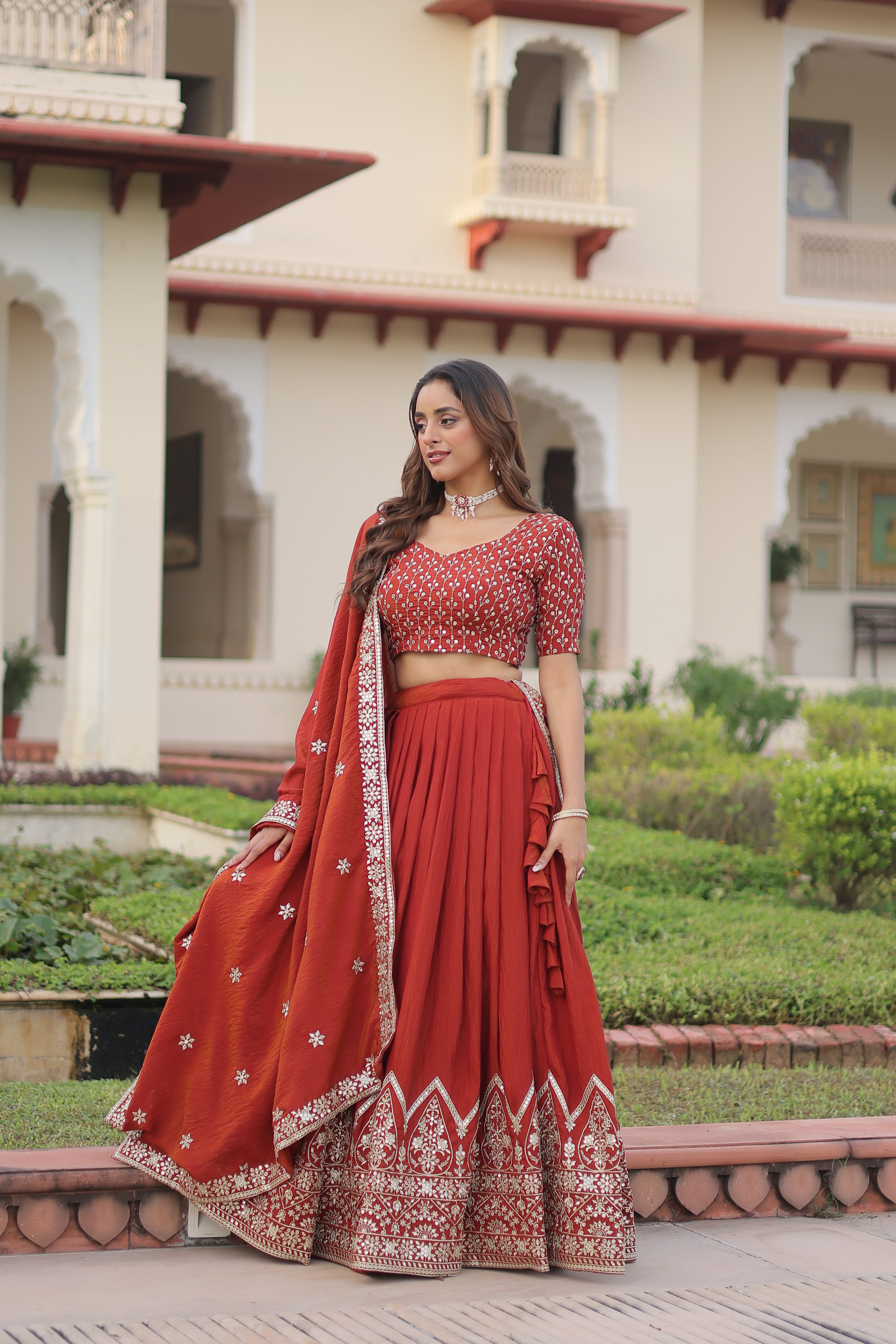 Omira Orange Color Vichitra Silk Sequins Thread Embroidered Lehenga Choli