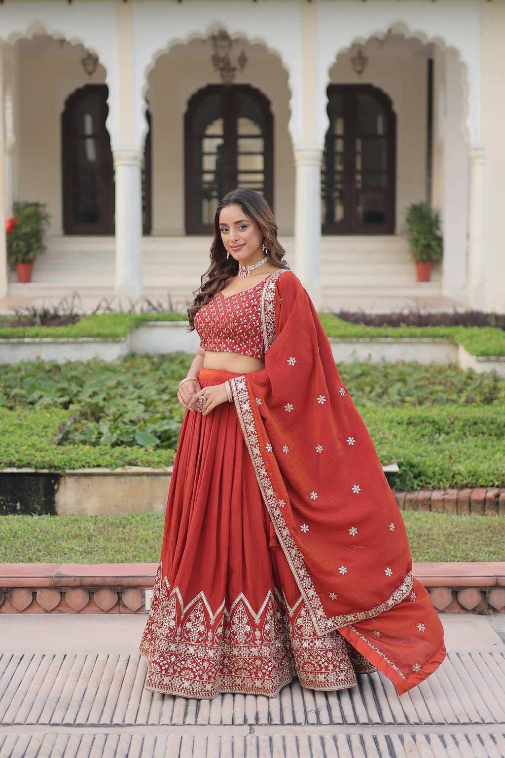 Omira Orange Color Vichitra Silk Sequins Thread Embroidered Lehenga Choli