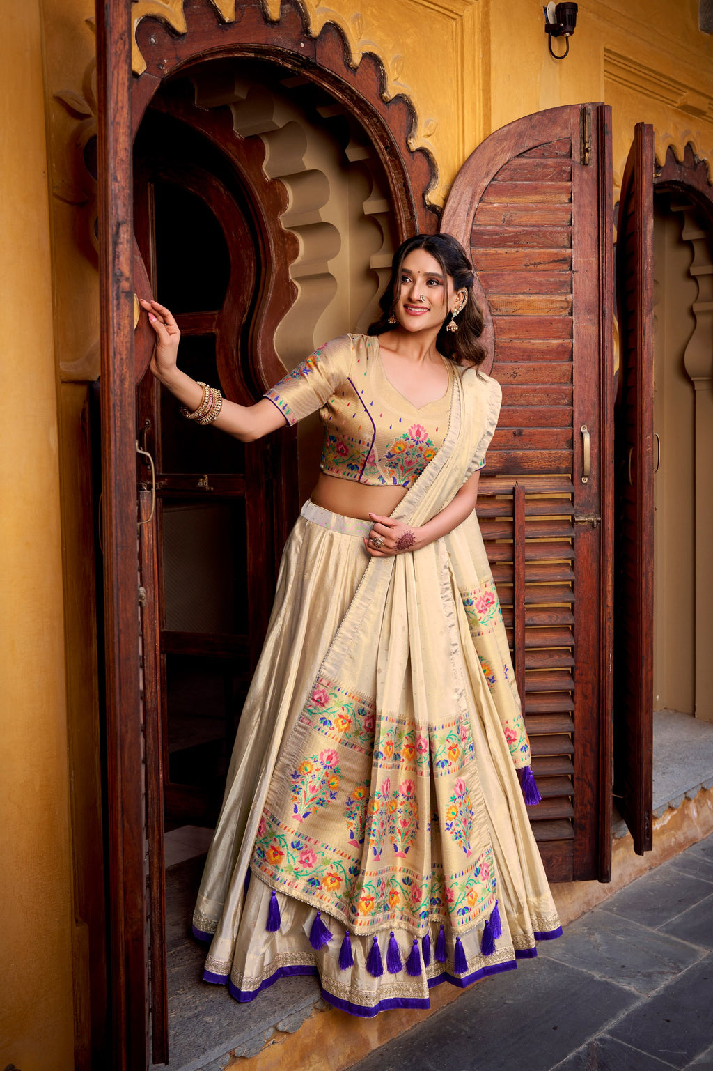 Kalyani cream shimmer paithani zari weaving purple border lehenga choli set
