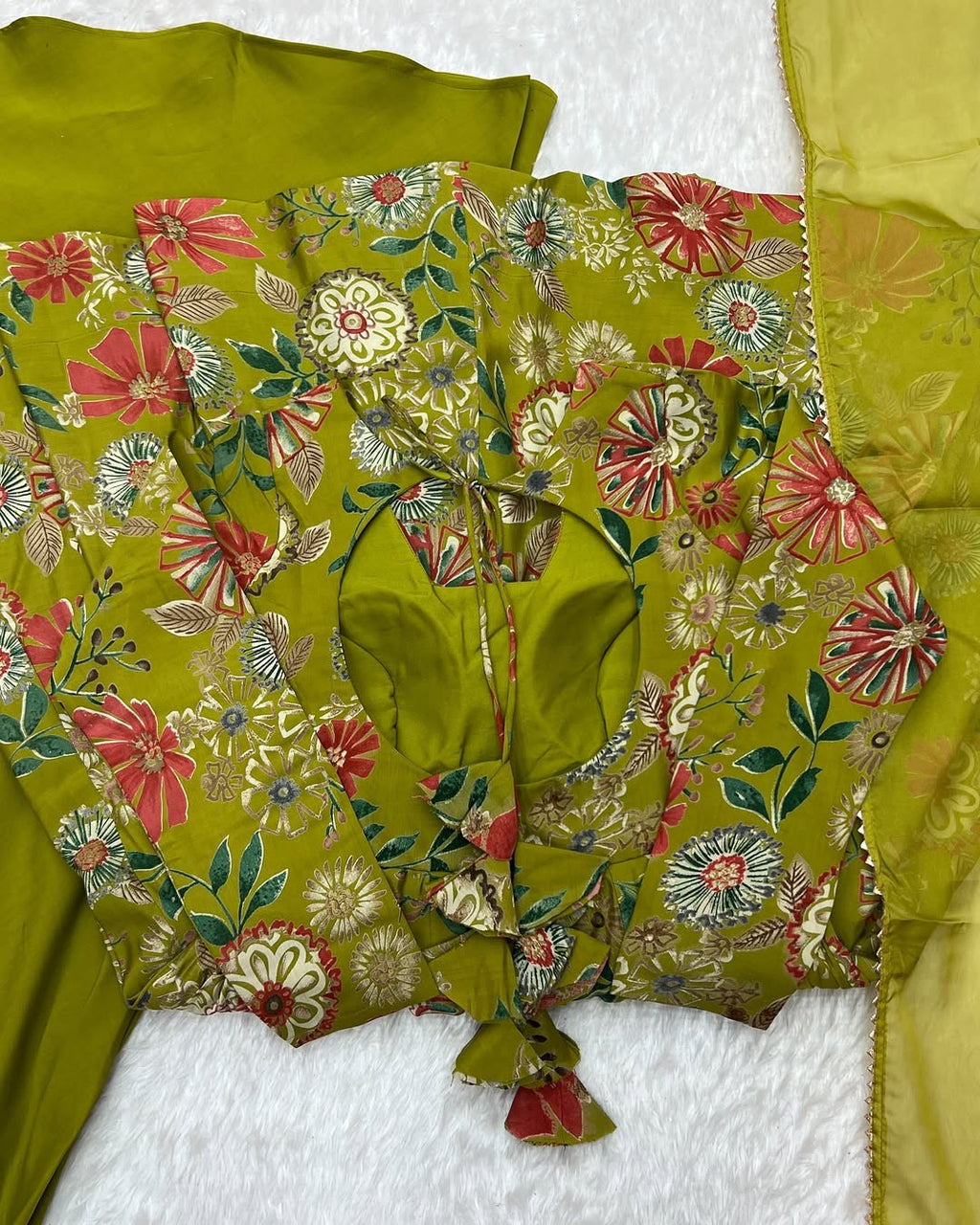 Karisma Green Kurti Plazzo Set – Roman Silk Chanderi kurti with discharge print, paired with plain Roman silk plazzo and soft tabby organza dupatta with lace border; lightweight, elegant ethnic set ideal for festive, office, or casual wear.