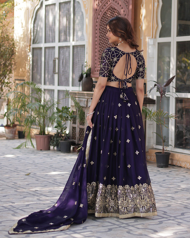Kiana Dark Purple Rangoli Silk Lehenga Choli with Intricate Embroidery, Heavy Work, and Designer Appeal – Perfect for Weddings, Brides, and Festive Celebrations.
