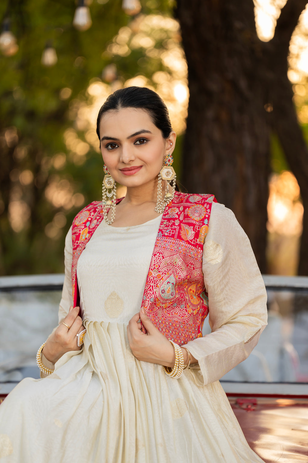 Off-white jacquard butti gown with pink koti