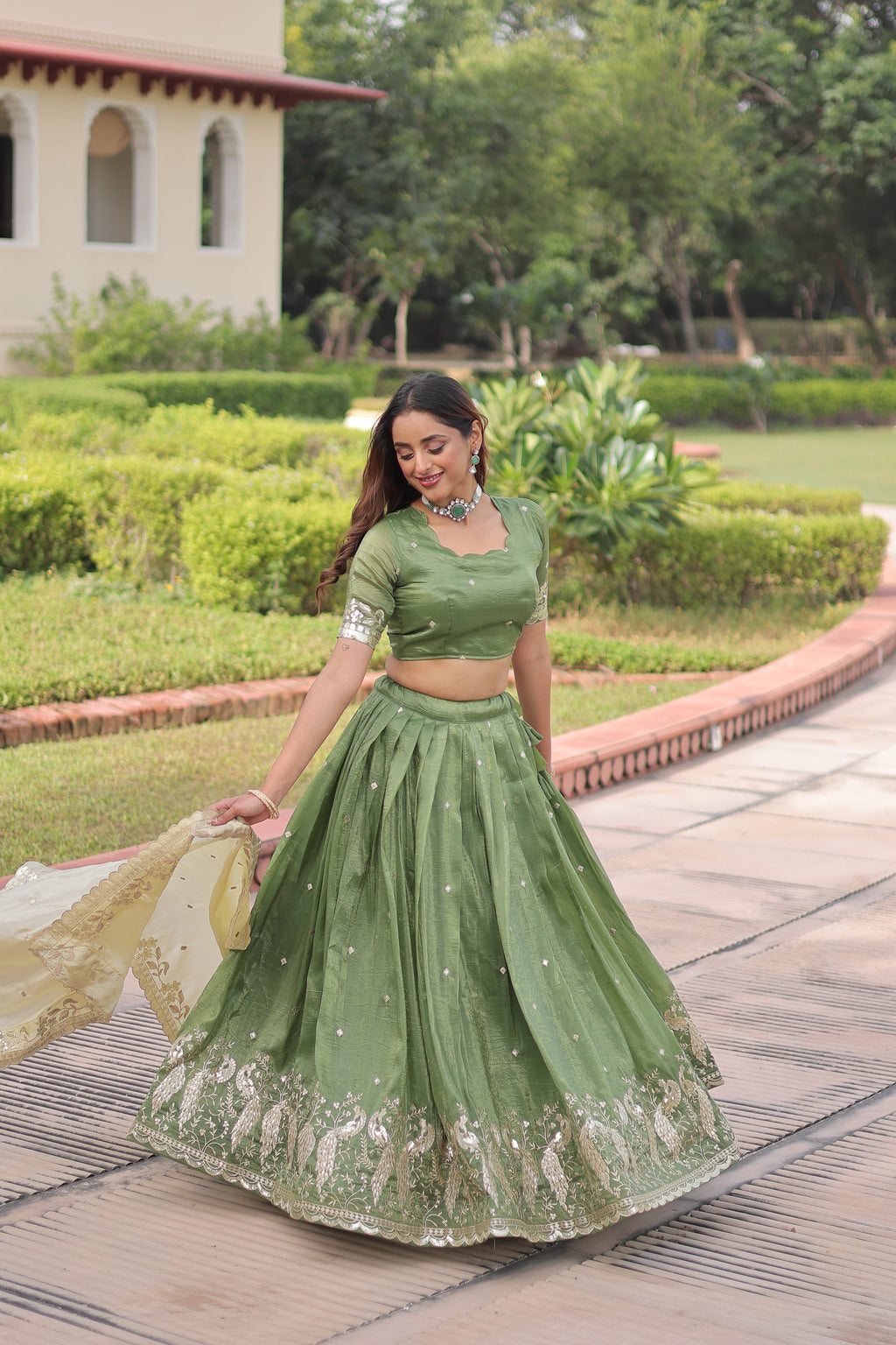 Nirika Green Color Gold Crush Sequins Zari Embroidered Work Lehenga Choli