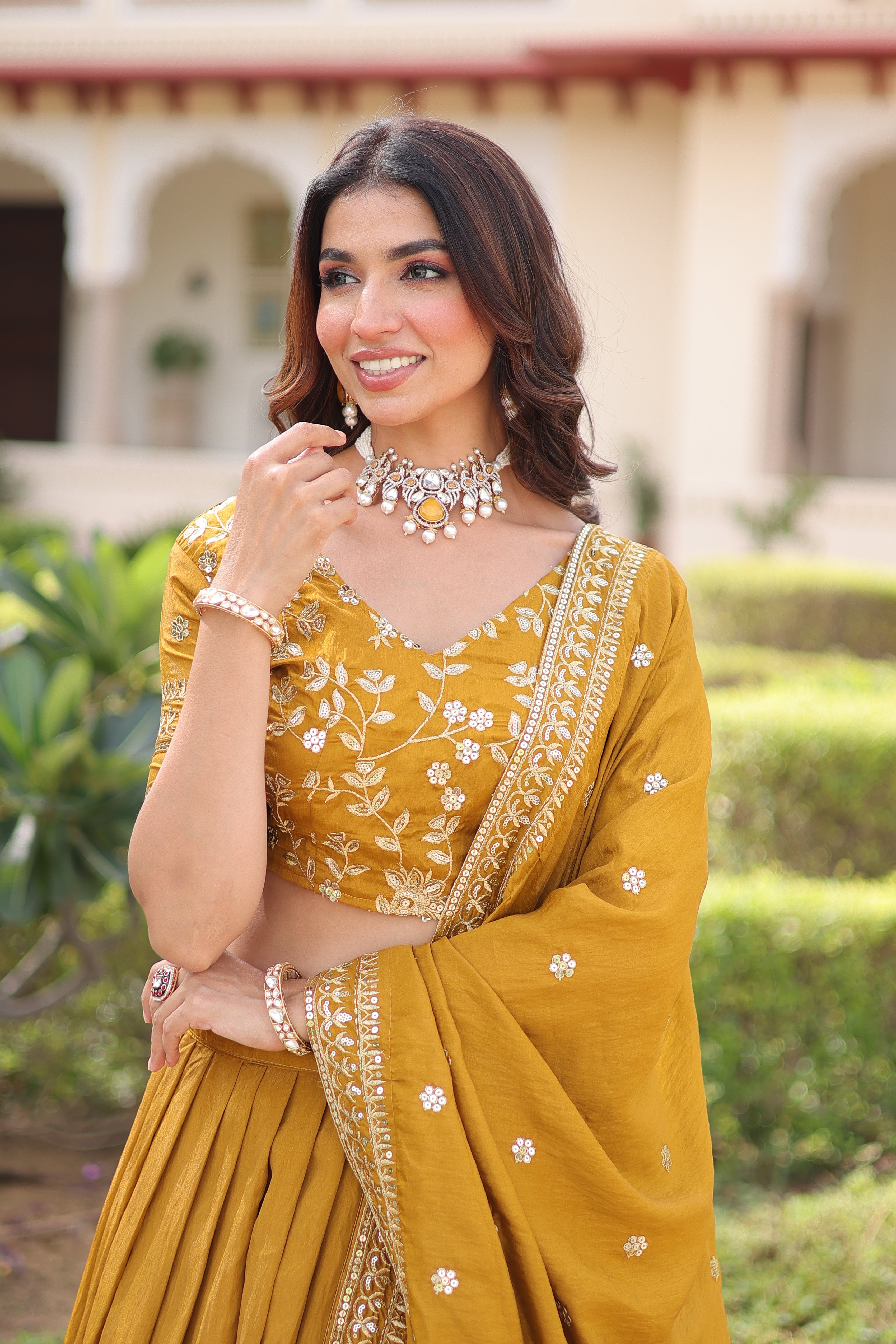 Ruvika Mustard Yellow Vichitra Silk Sequins Zari Embroidered Work Lehenga Choli