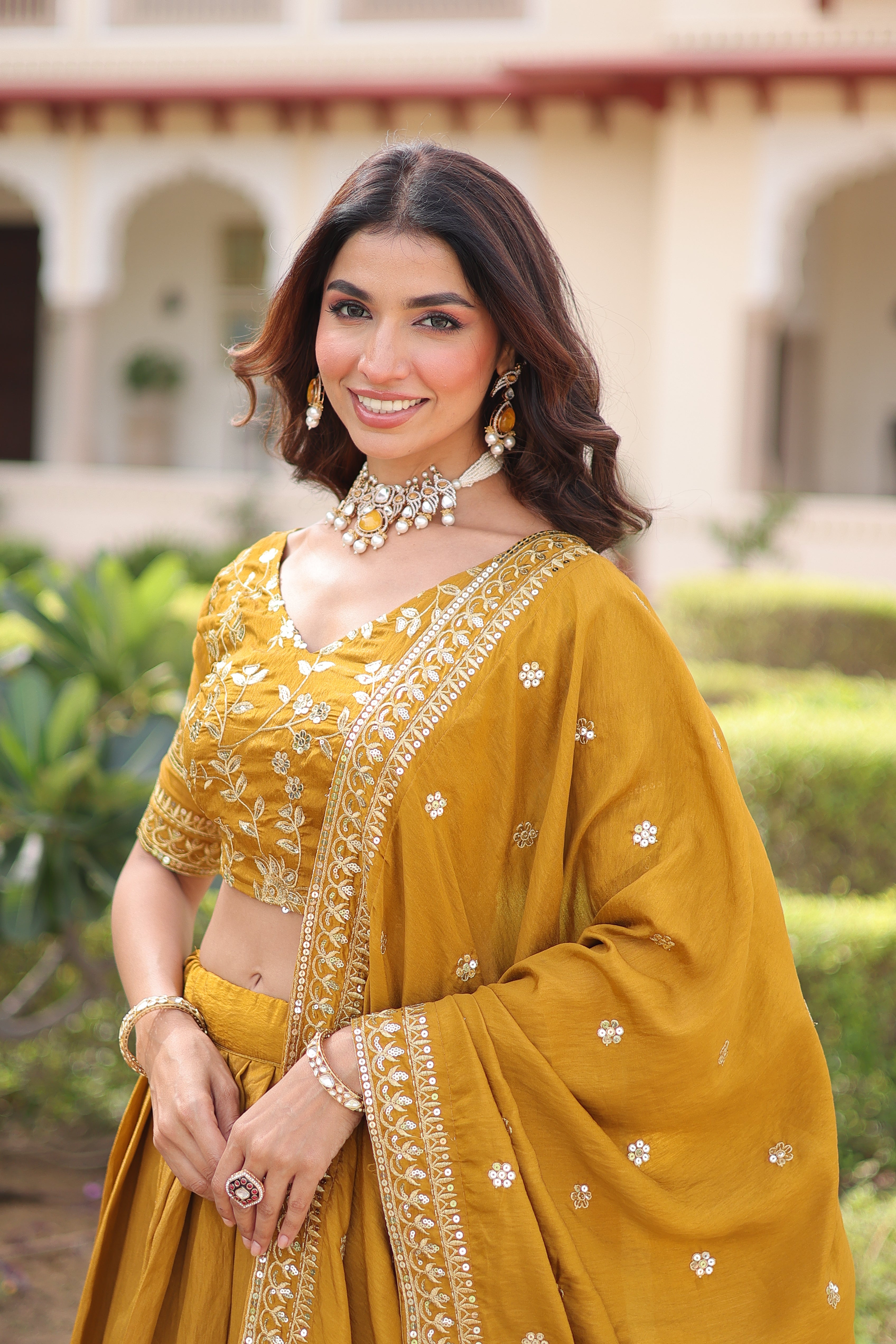 Ruvika Mustard Yellow Vichitra Silk Sequins Zari Embroidered Work Lehenga Choli