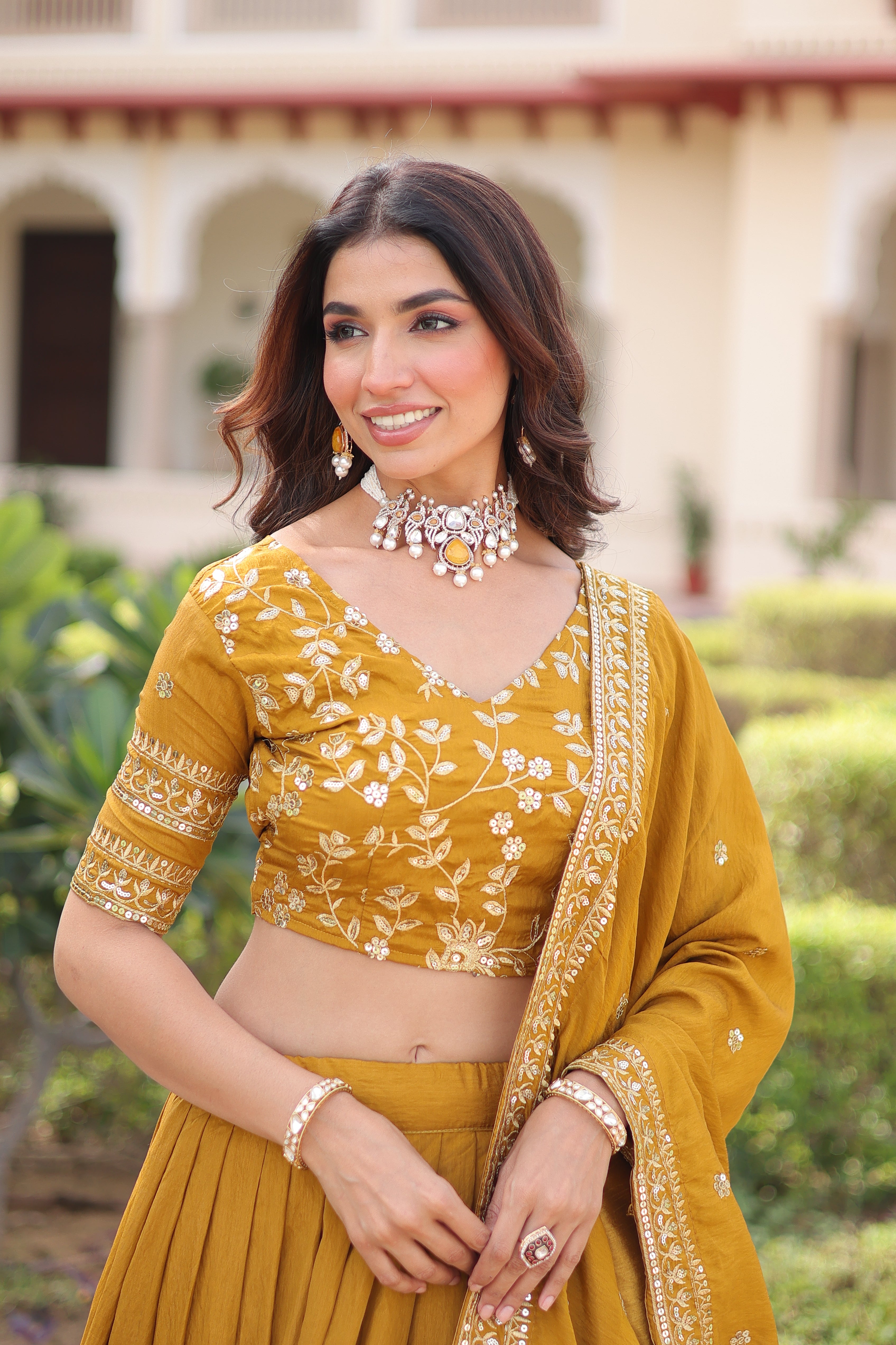 Ruvika Mustard Yellow Vichitra Silk Sequins Zari Embroidered Work Lehenga Choli