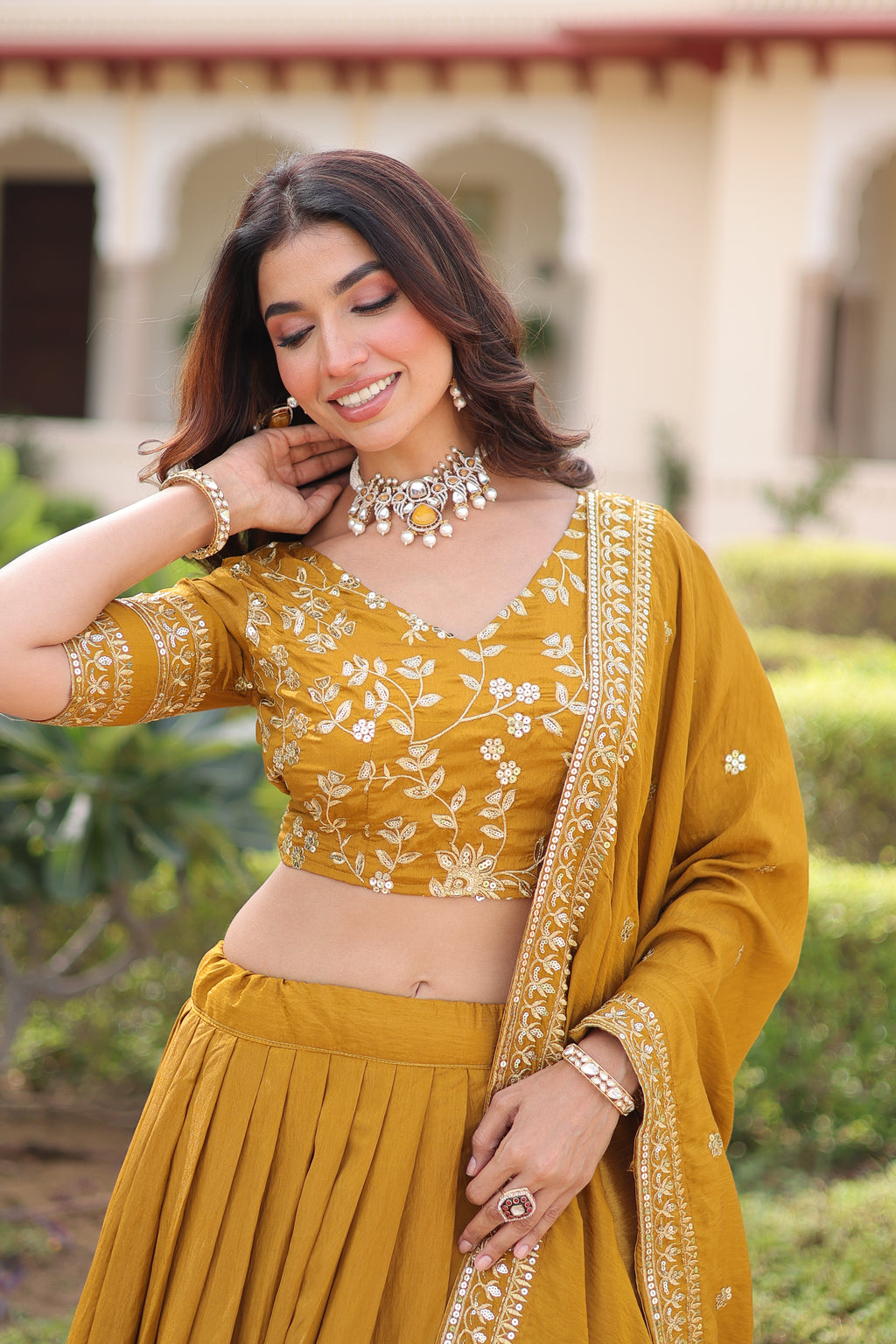 Ruvika Mustard Yellow Vichitra Silk Sequins Zari Embroidered Work Lehenga Choli